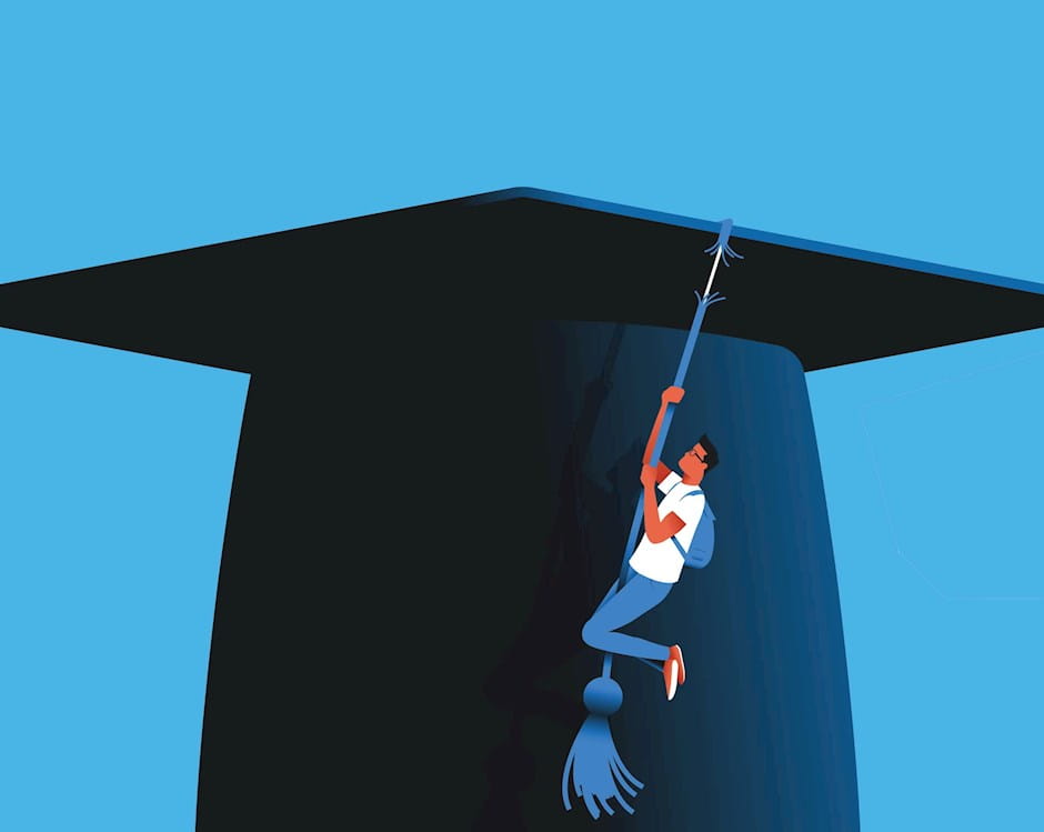 Student clinging to fraying tassel