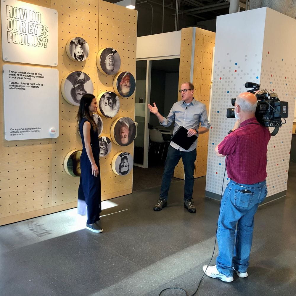 Fox 32 interviewing Jasmine Kwong on camera at Mindworks 