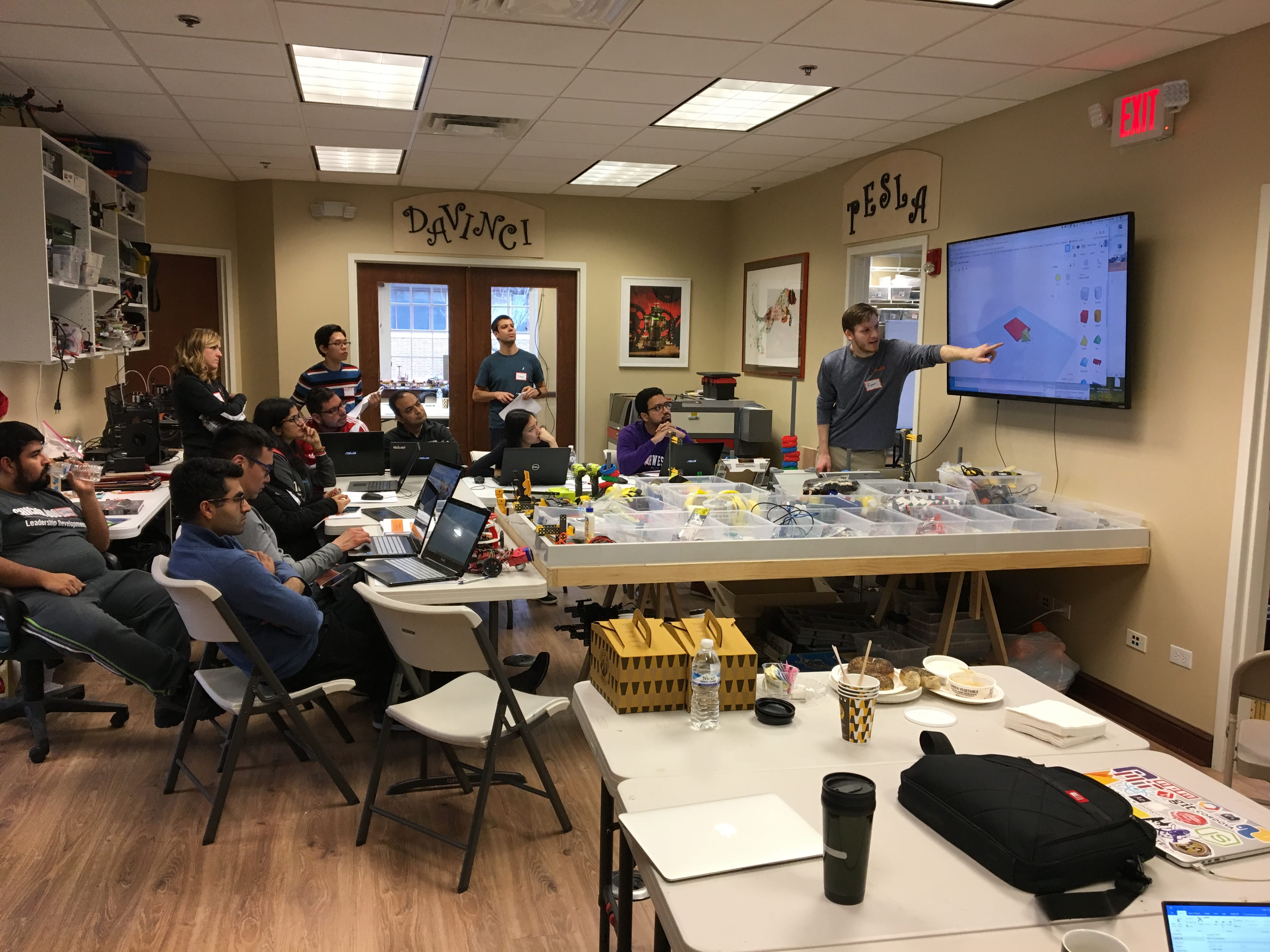 Photo of group watching presentation at the TinkRworks workshop