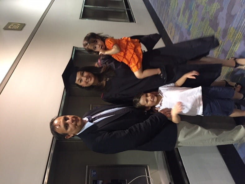 Photo of Akshata Puri in front of Chicago Booth's Gleacher Center