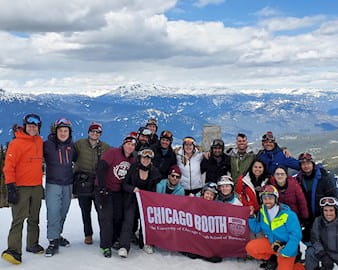 Booth Evening and Weekend MBA students on a ski trip with the Outdoors Club