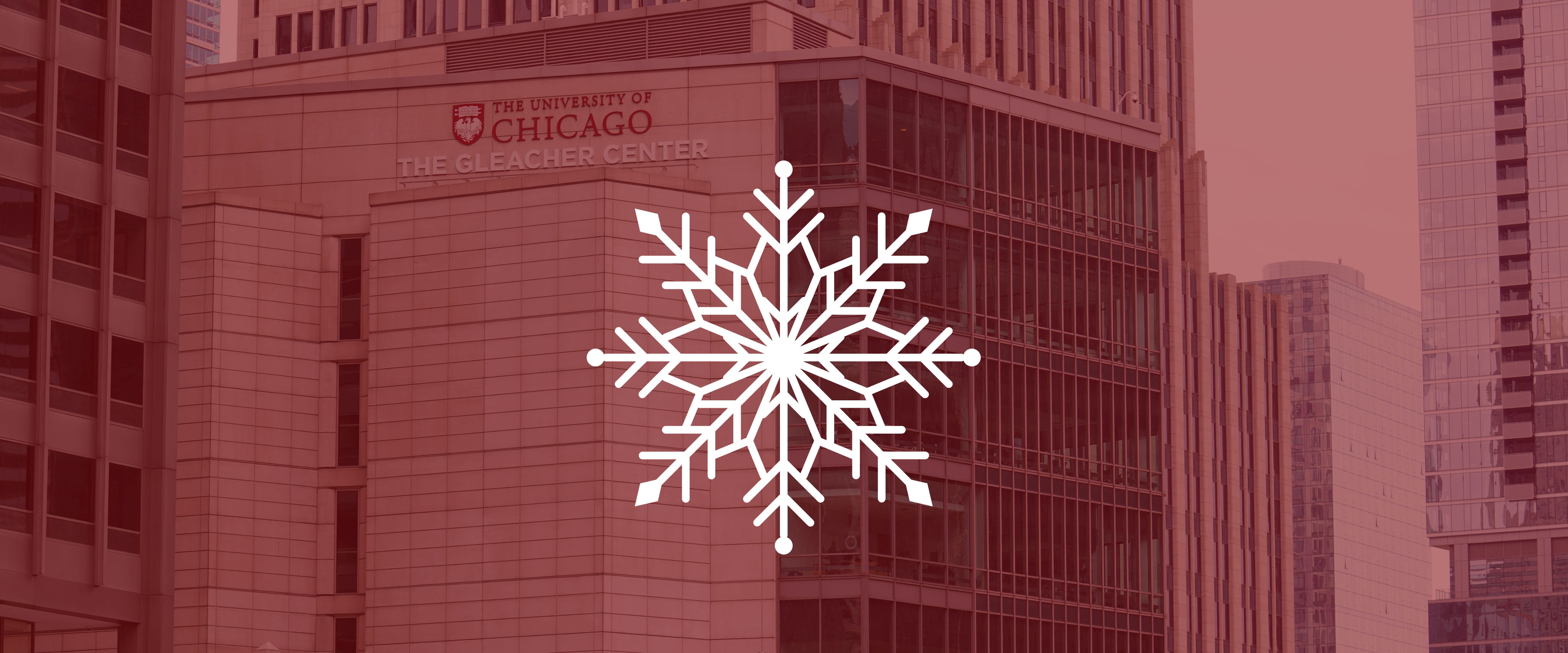 Gleacher Center in background with white snowflake on top in center