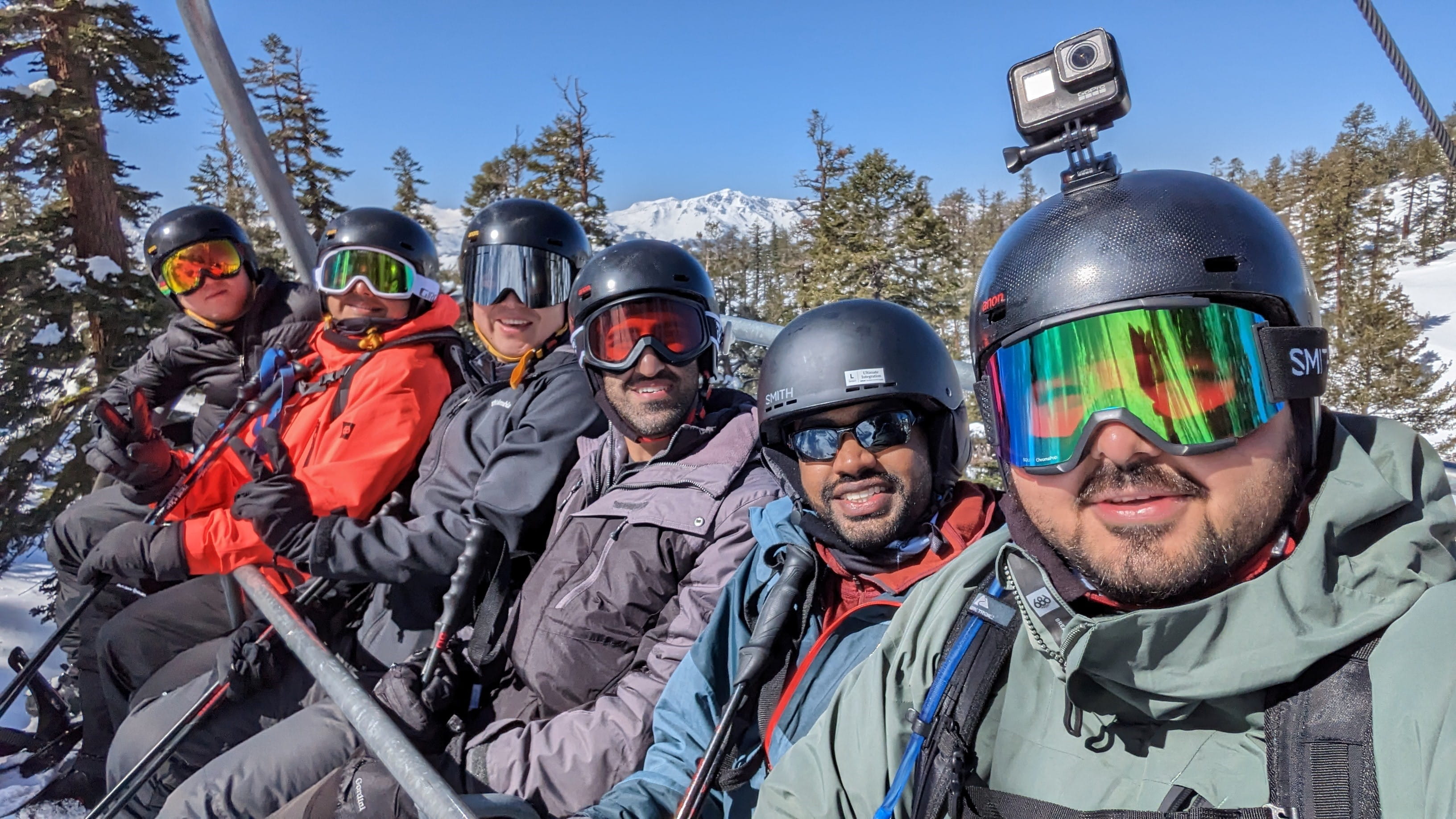 Boothies taking a selfie in ski gear on the Evening Weekend ski trip