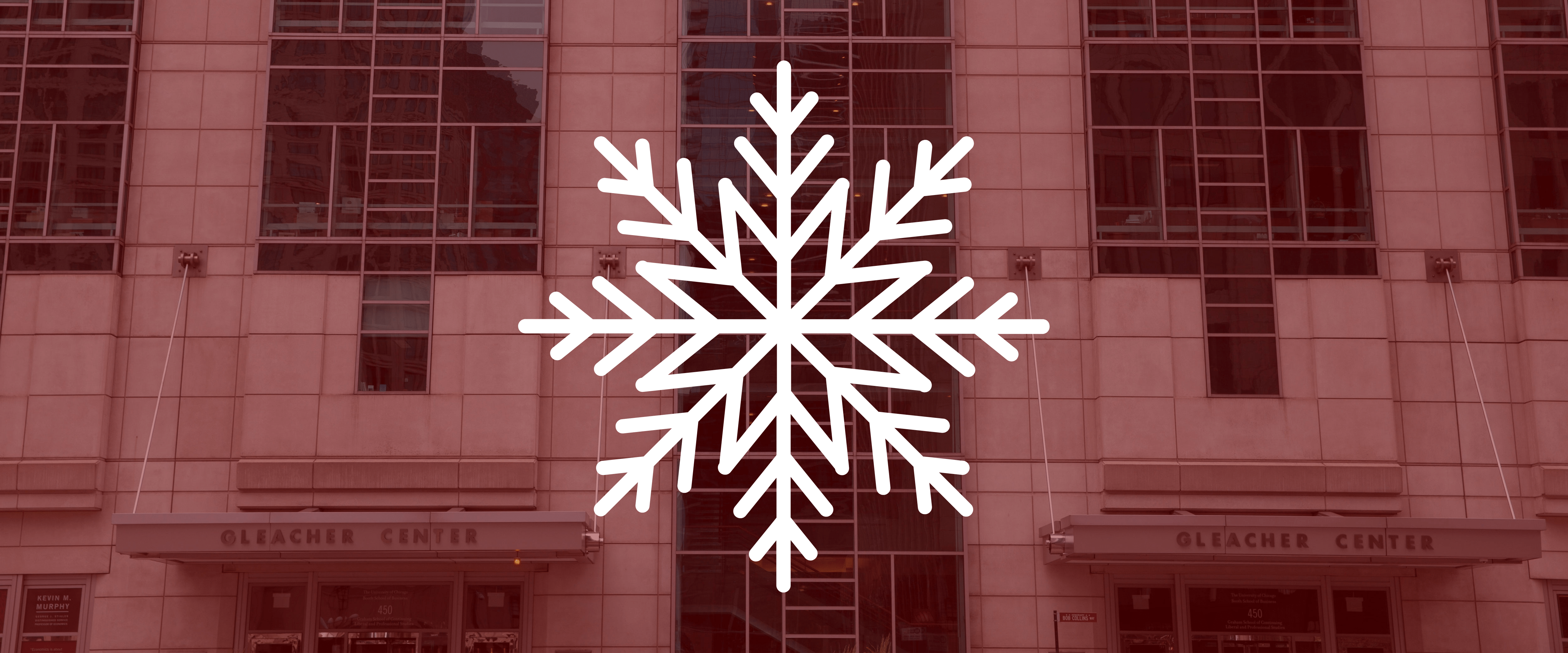 Front of Gleacher Center building with maroon overlay and white snowflake on top
