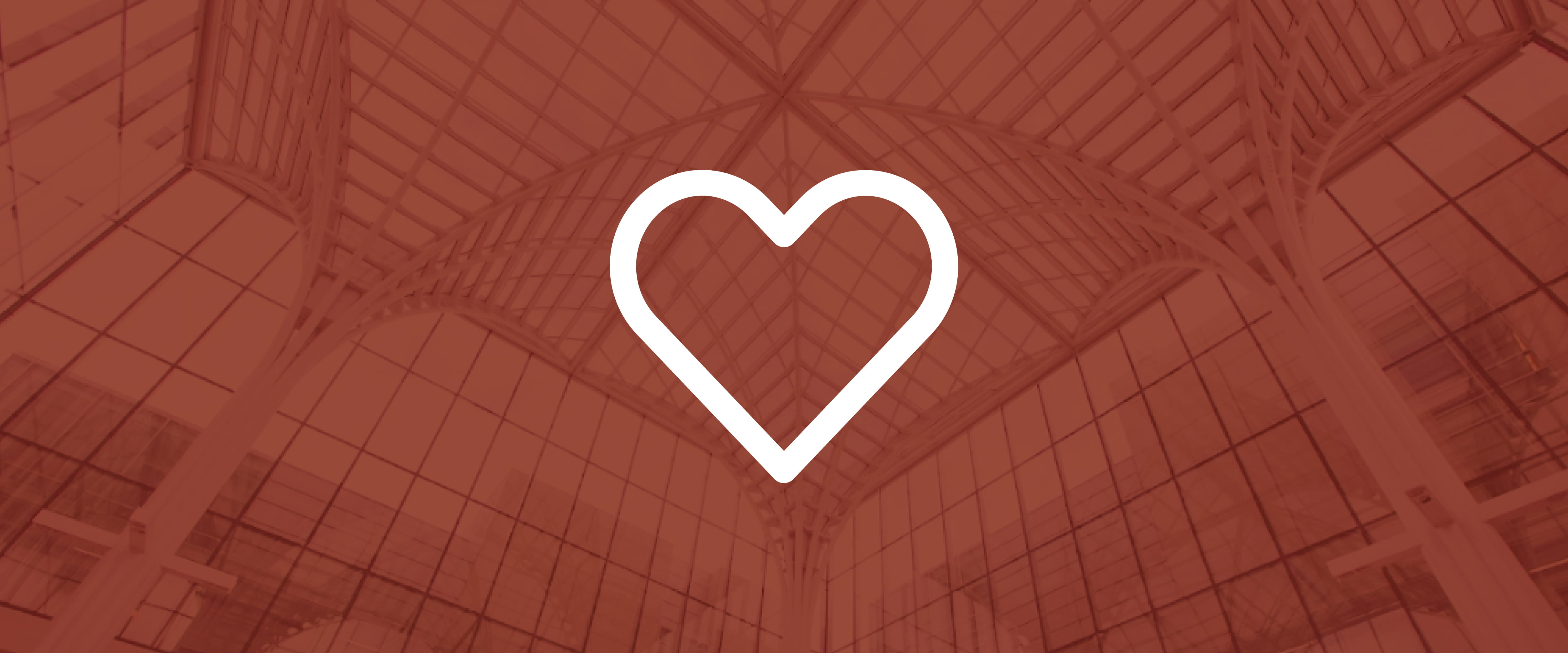 Harper Center ceiling in background with Booth maroon and white heart on top 