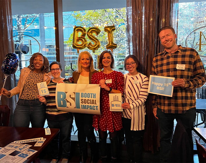 members of Booth Social Impact club celebrating 15 year anniversary 