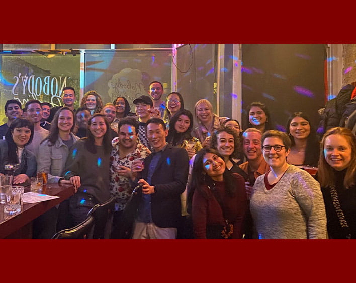Large group of Booth Pride members posing together