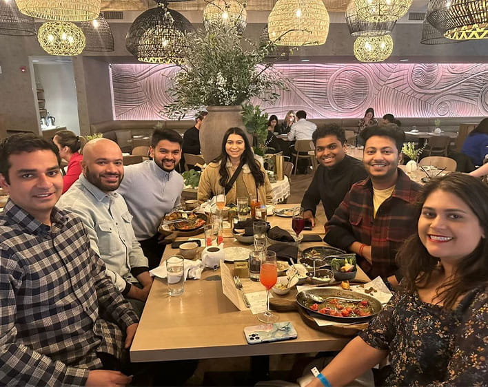 Booth South Asian Club members at dinner together 