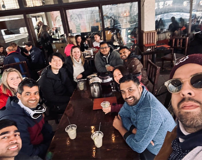 Selfie of Gil Jimenez with friends at restaurant 