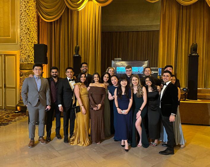 group photo of Sarah and friends at formal event 