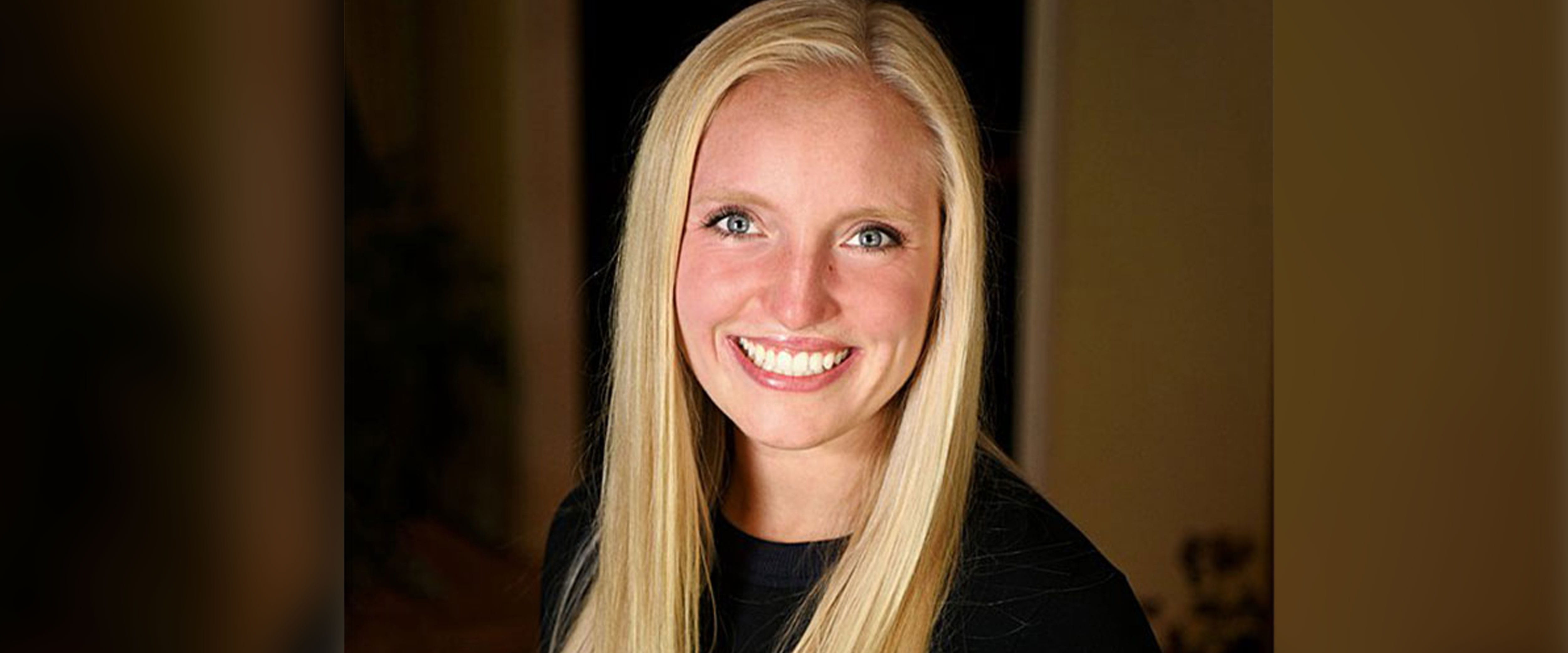 Anna Zumwinkle headshot with blurred background