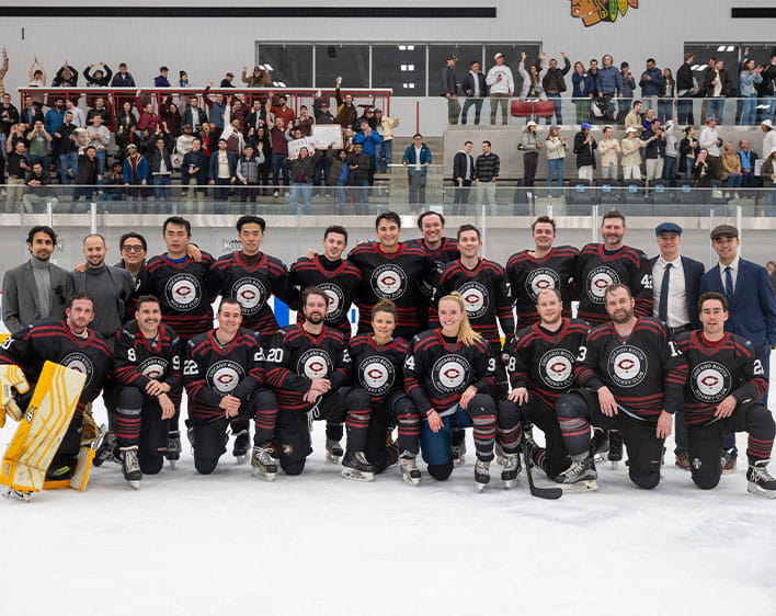 group photo of Anna and teammates from Booth Hockey Club