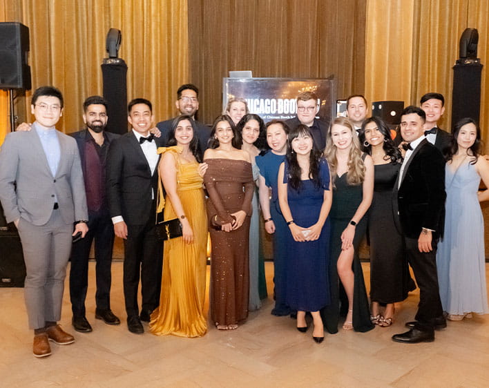 group photo of Richa Patwa and Boothies in formal wear