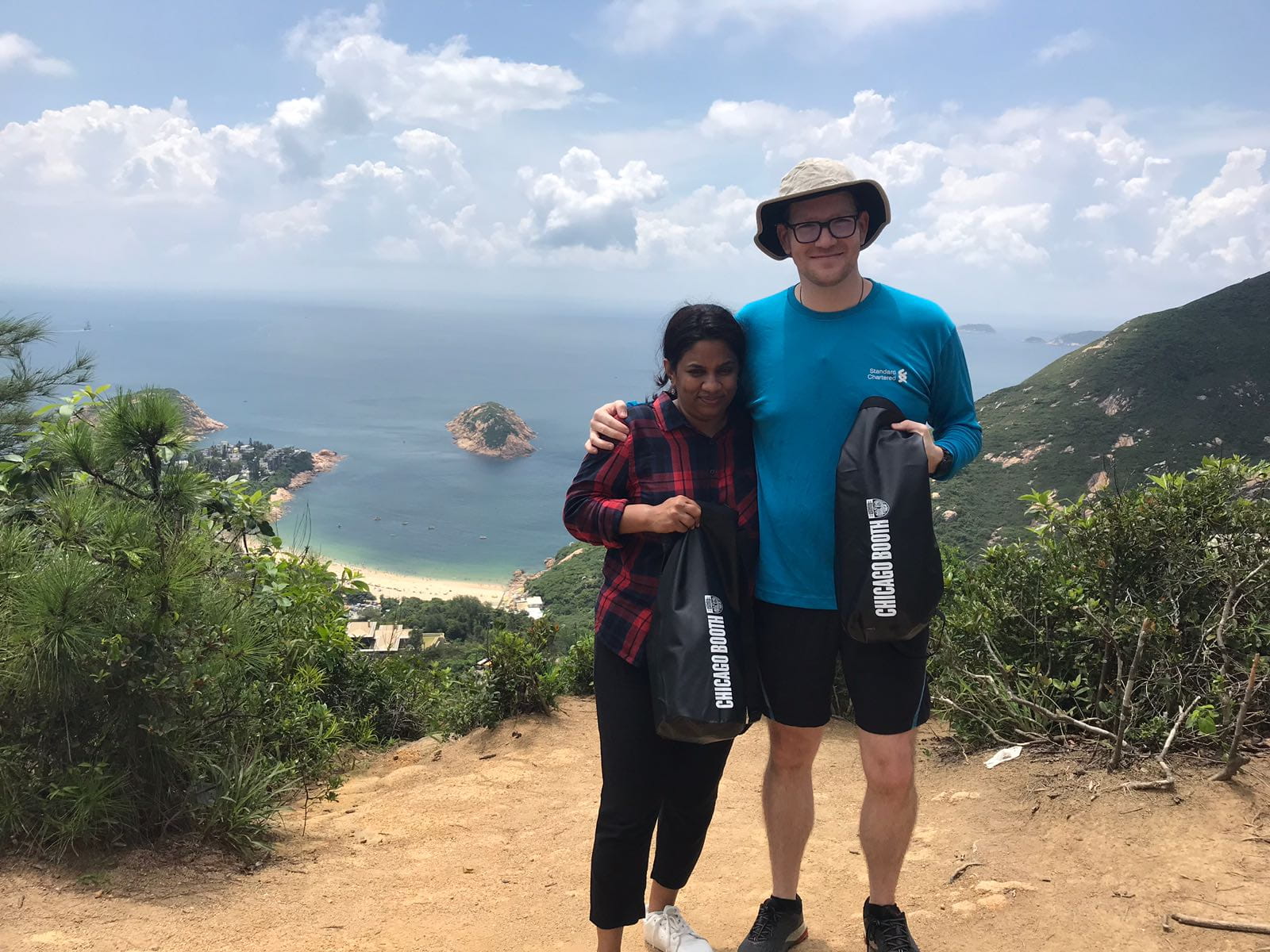 Booth Executive MBA students smiling for a photo