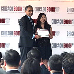 Diane Long smiles and poses with Dean Madhav Rajan