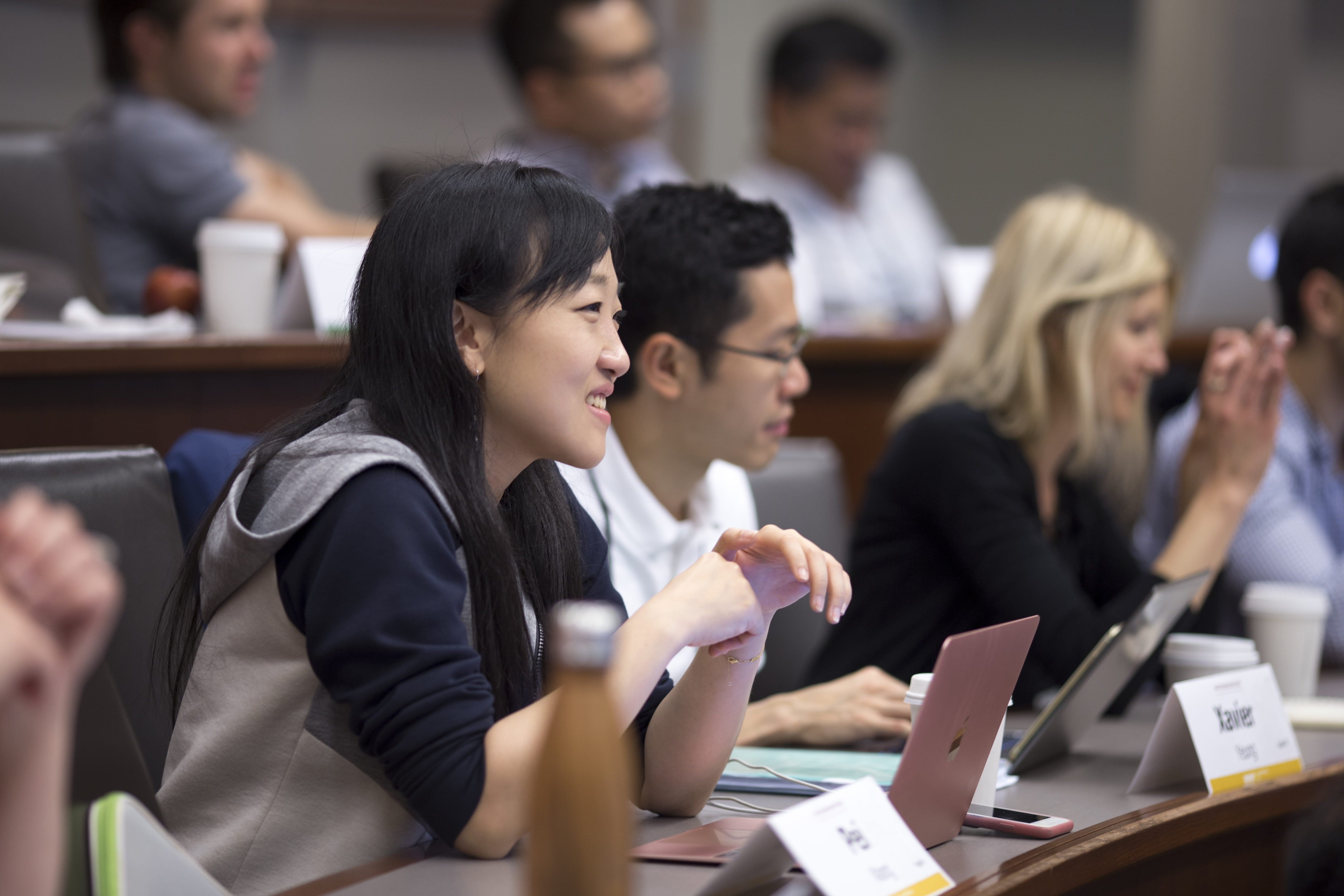 A female student smiles during class