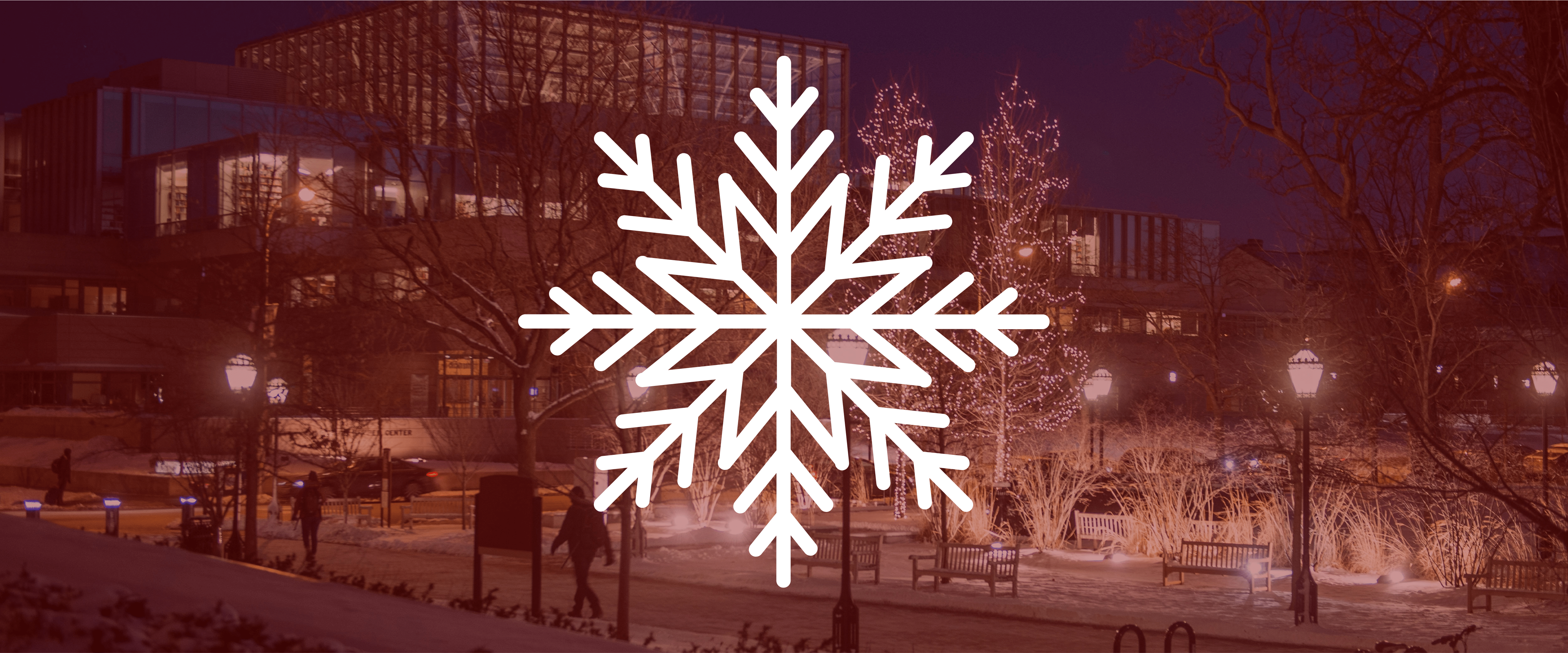 Harper Center during wintertime at night with lights with red overlay and snowflake icon