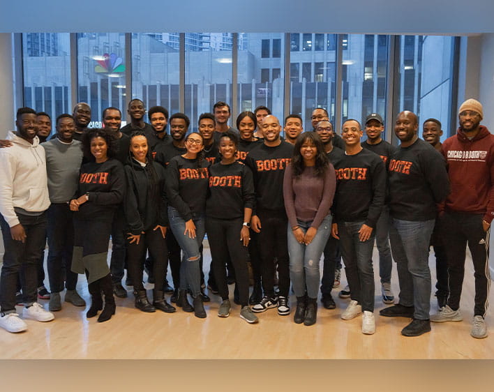 A group of members from the African American MBA Association posing together 