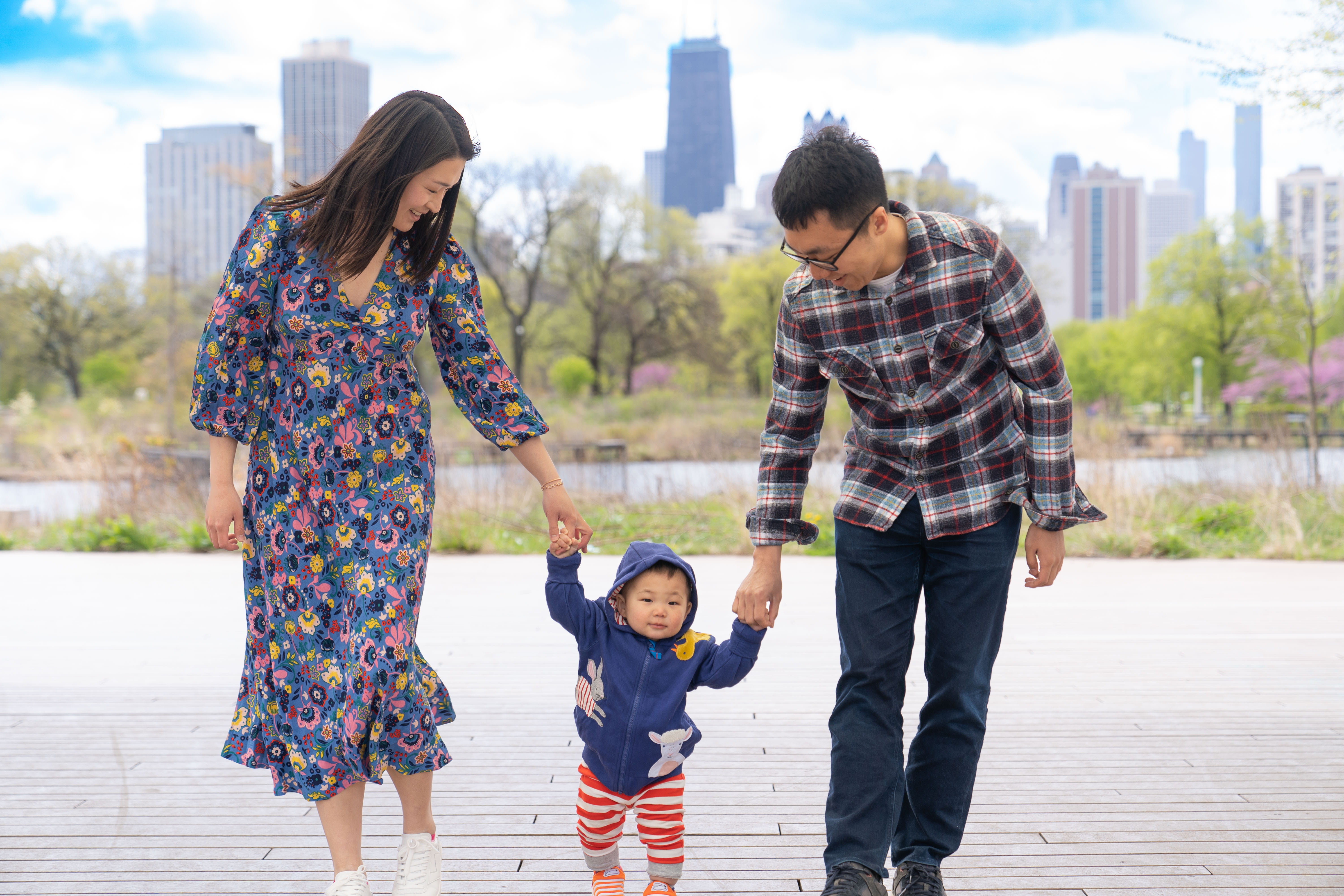 Rae X. Liu and her family in family photo outside downtown Chicago
