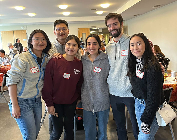 group of Giving Something Back group members at an event