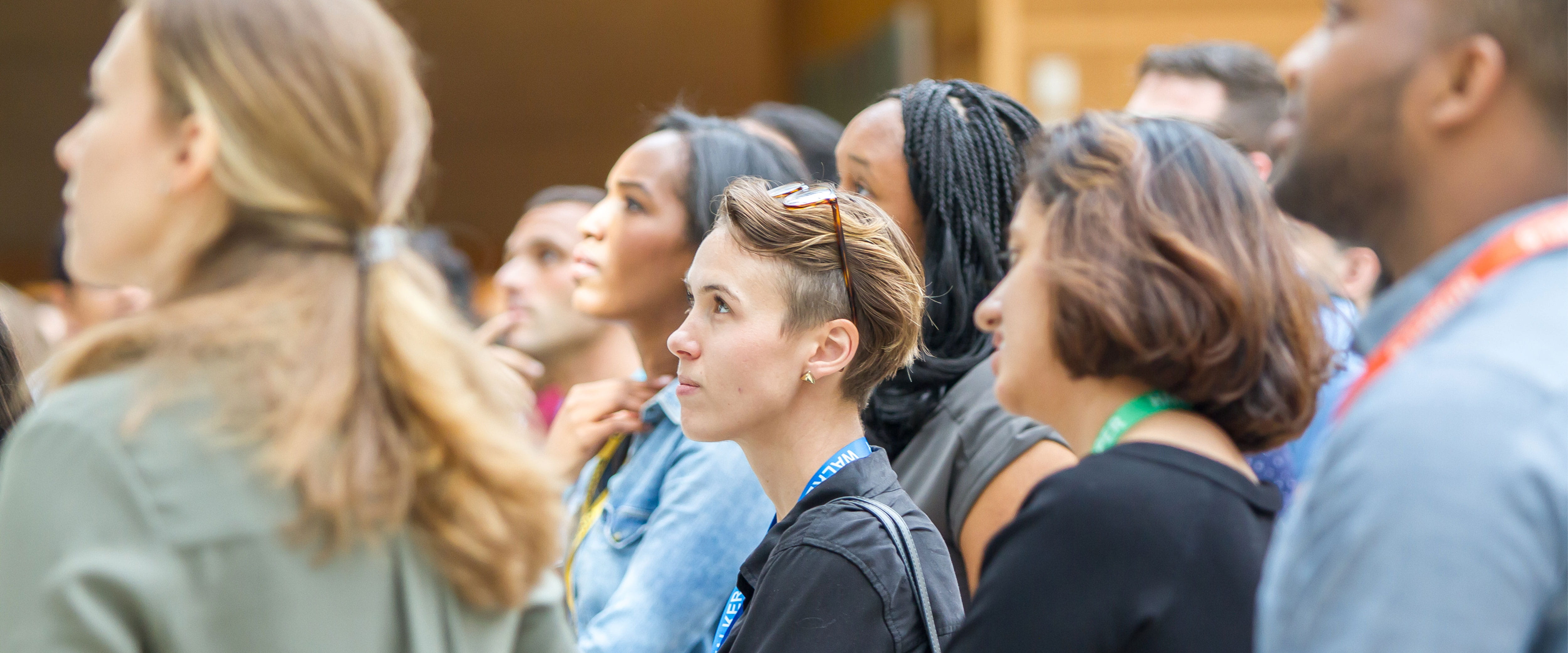 Crowd of people looking forward