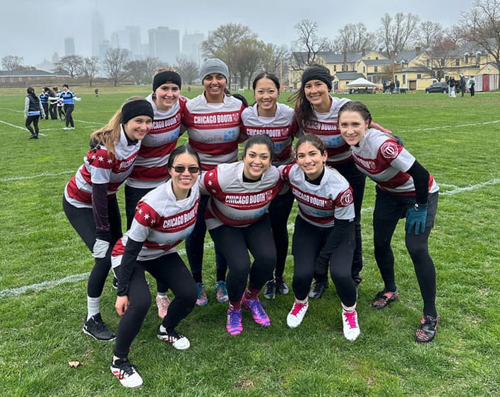 group photo of Natalie Chun and other Boothies in their athletic uniforms