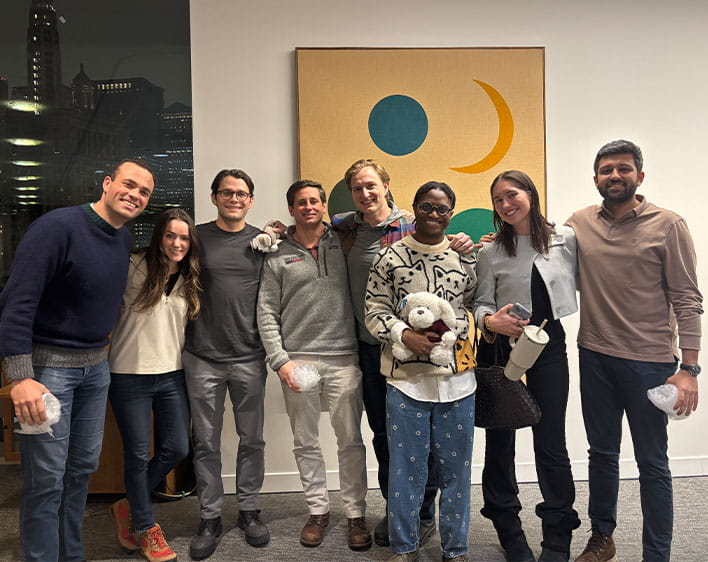 group photo of GBC trivia night winners, including Jaire 