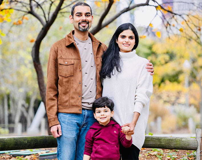 family portrait of Manu Chintapalli with her husband and child