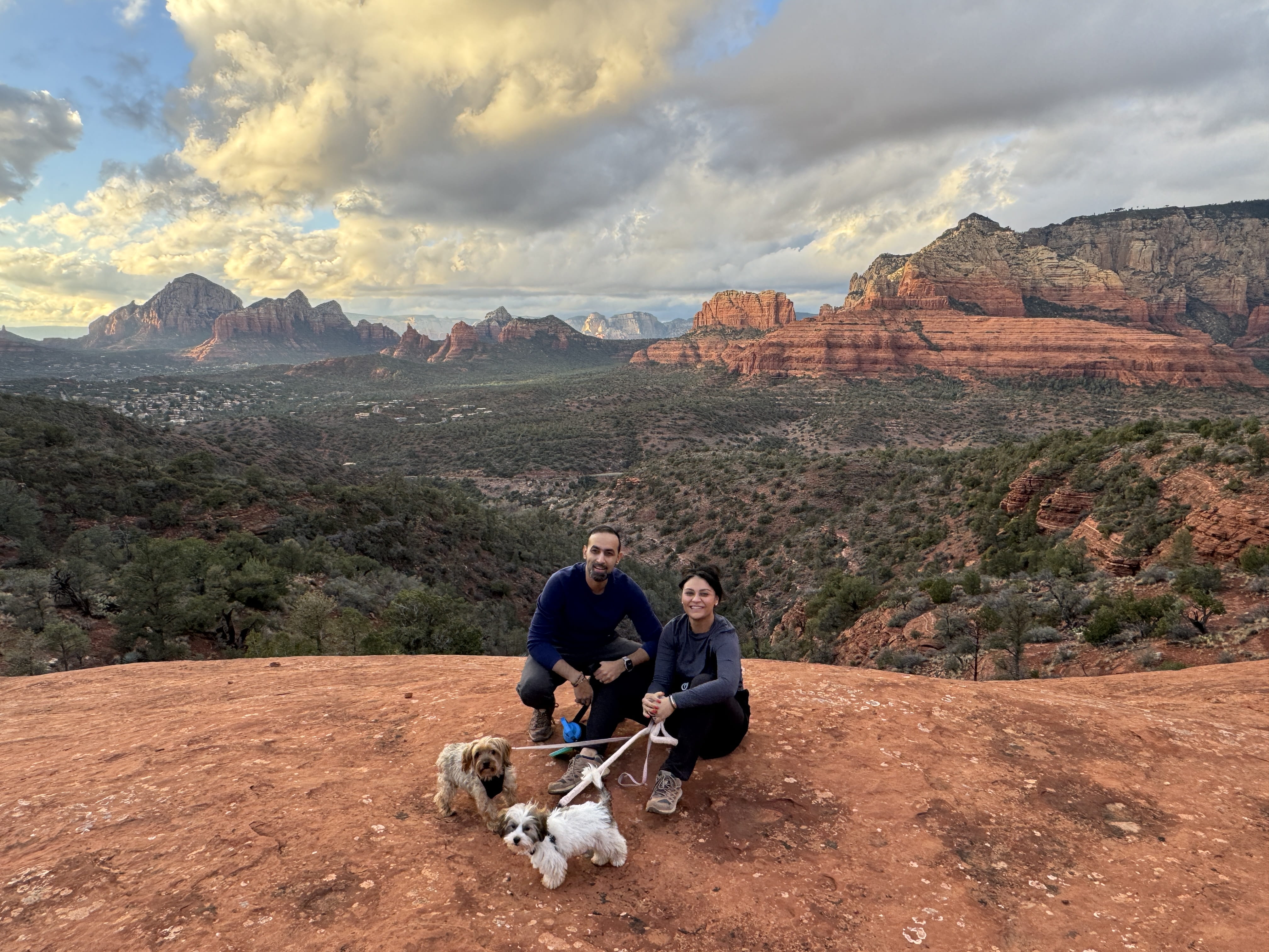 Anushka and Abhishek in nature with their two dogs