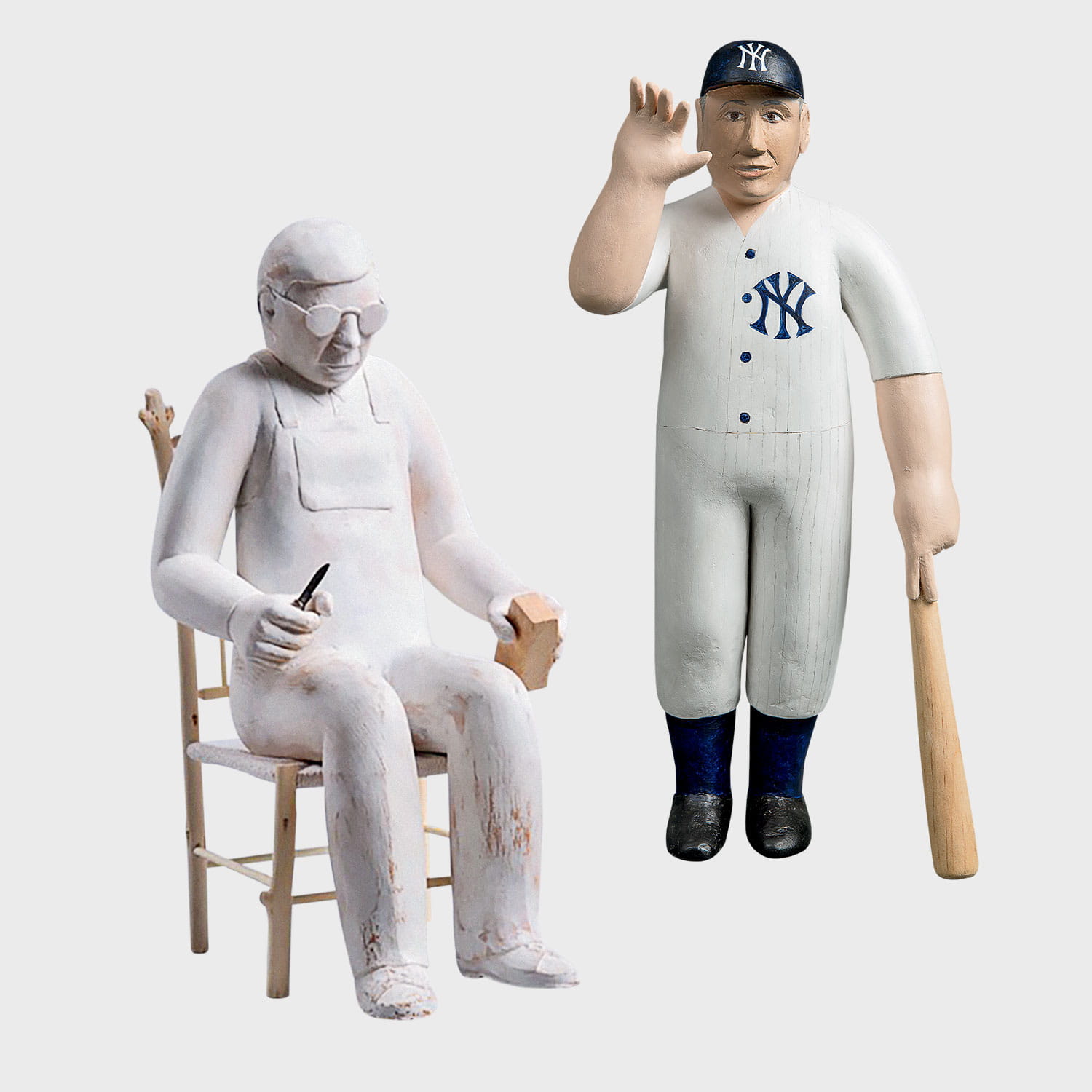 Photo of a carvings titled Self-Portrait (2010) and Goodbye Joe (2014)