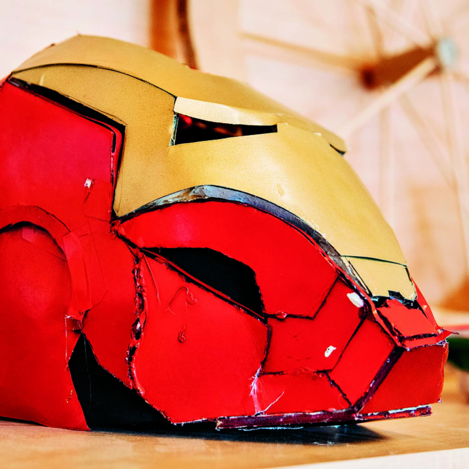 Hand-made Iron Man helmet sculpture by children at Kids Science Labs