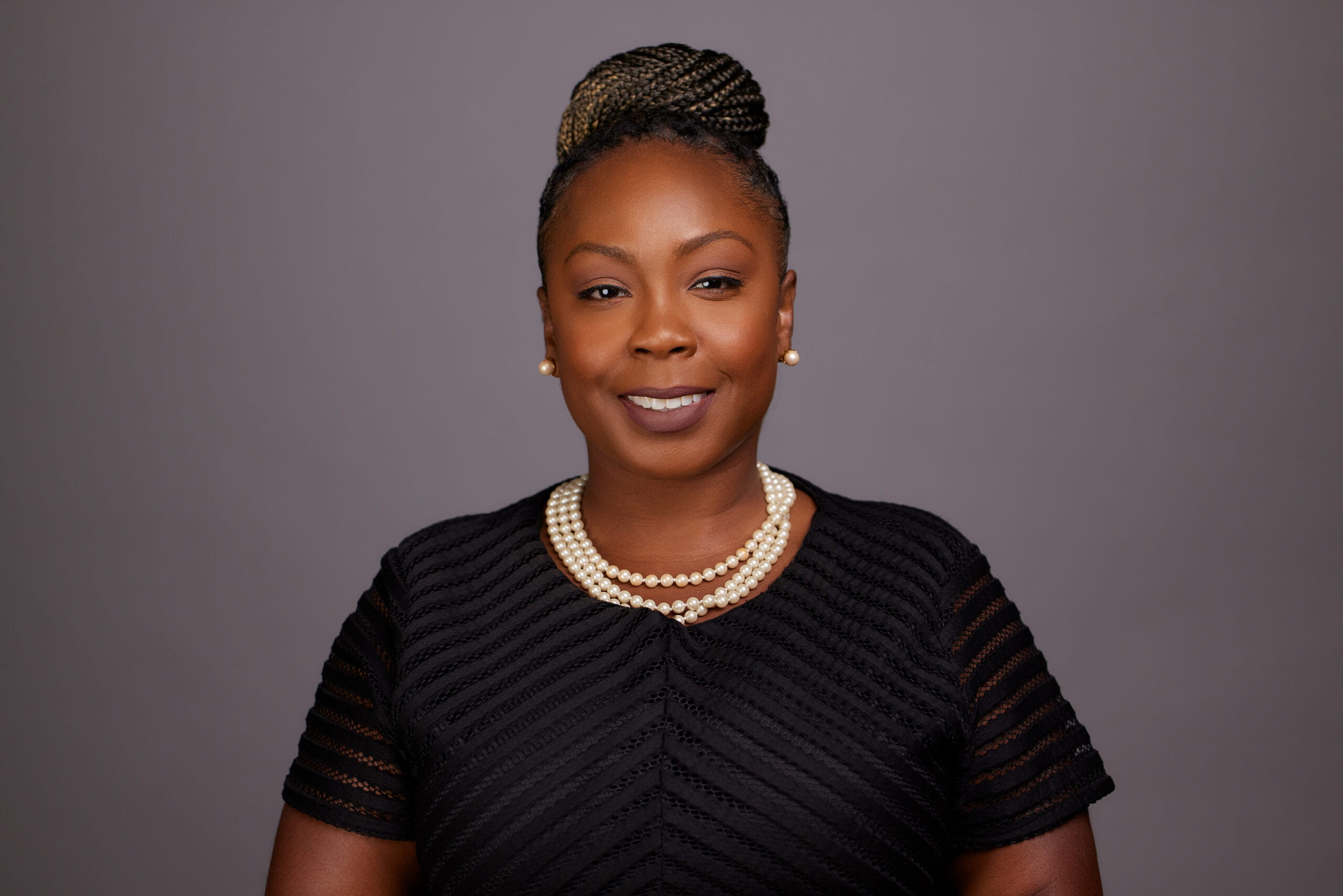 A woman smiling at the camera