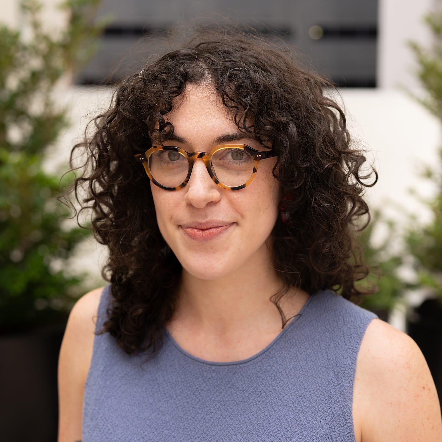 A woman looking at the camera