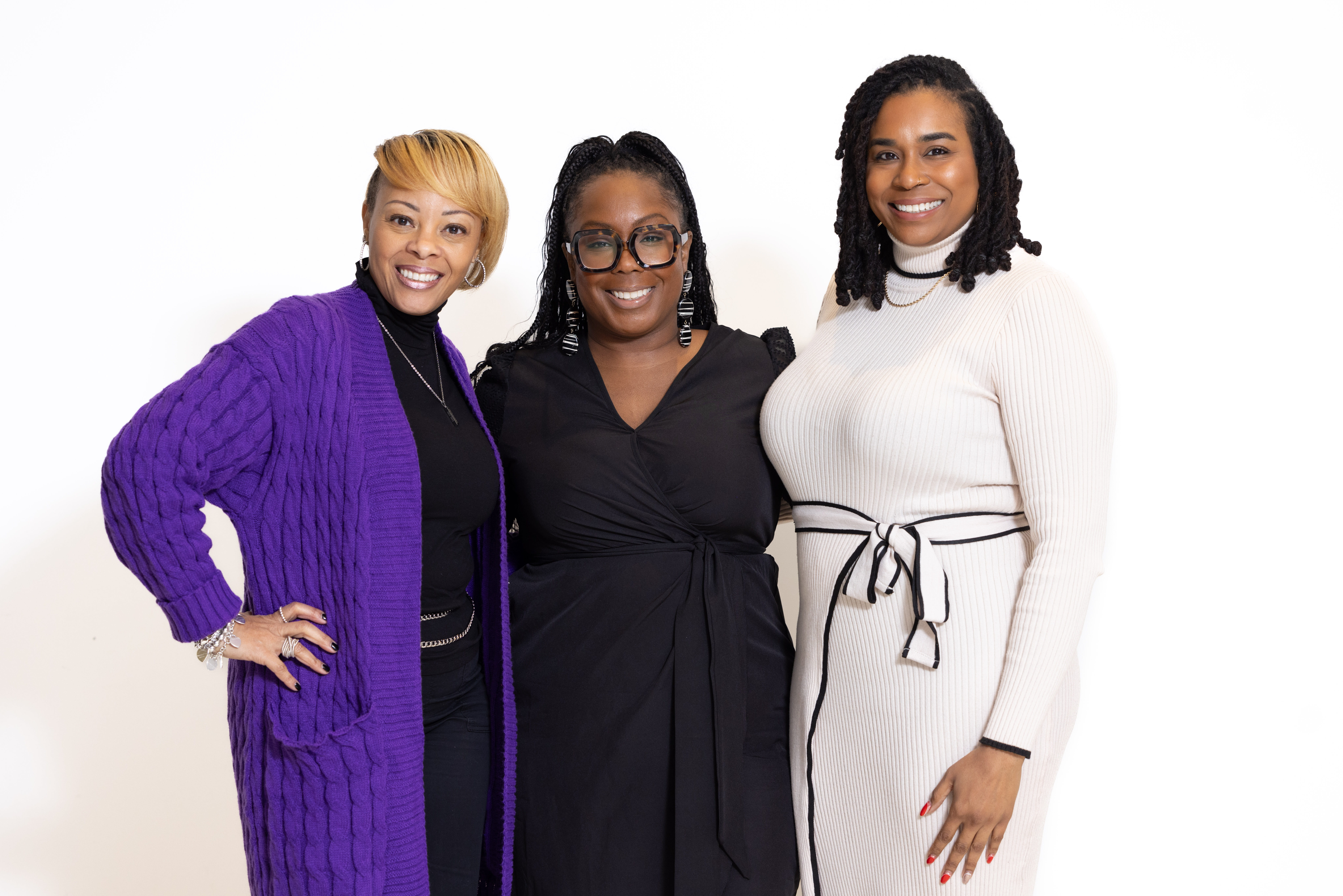 Three women standing together