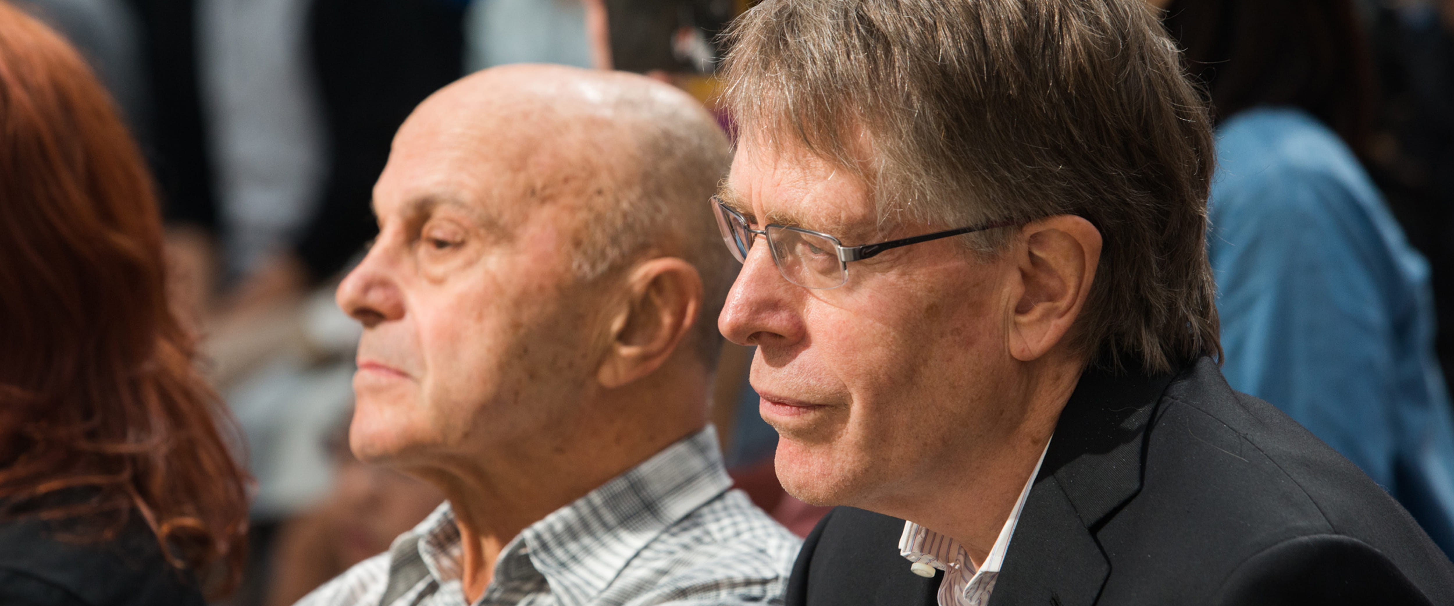 Eugene Fama and Lars Peter Hansen sitting in the audience at Thaler’s nobel announcement