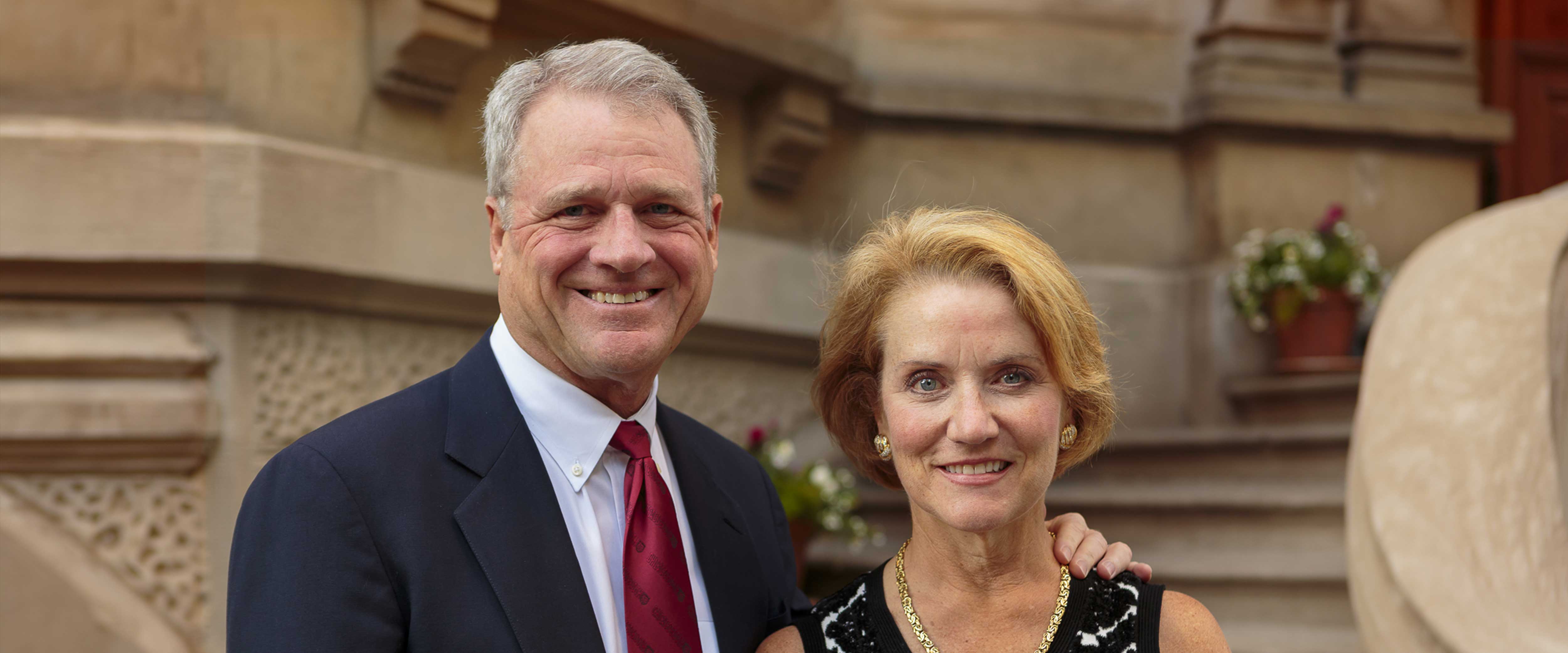 Alumnus John Edwardson and Fran Edwardson standing together.