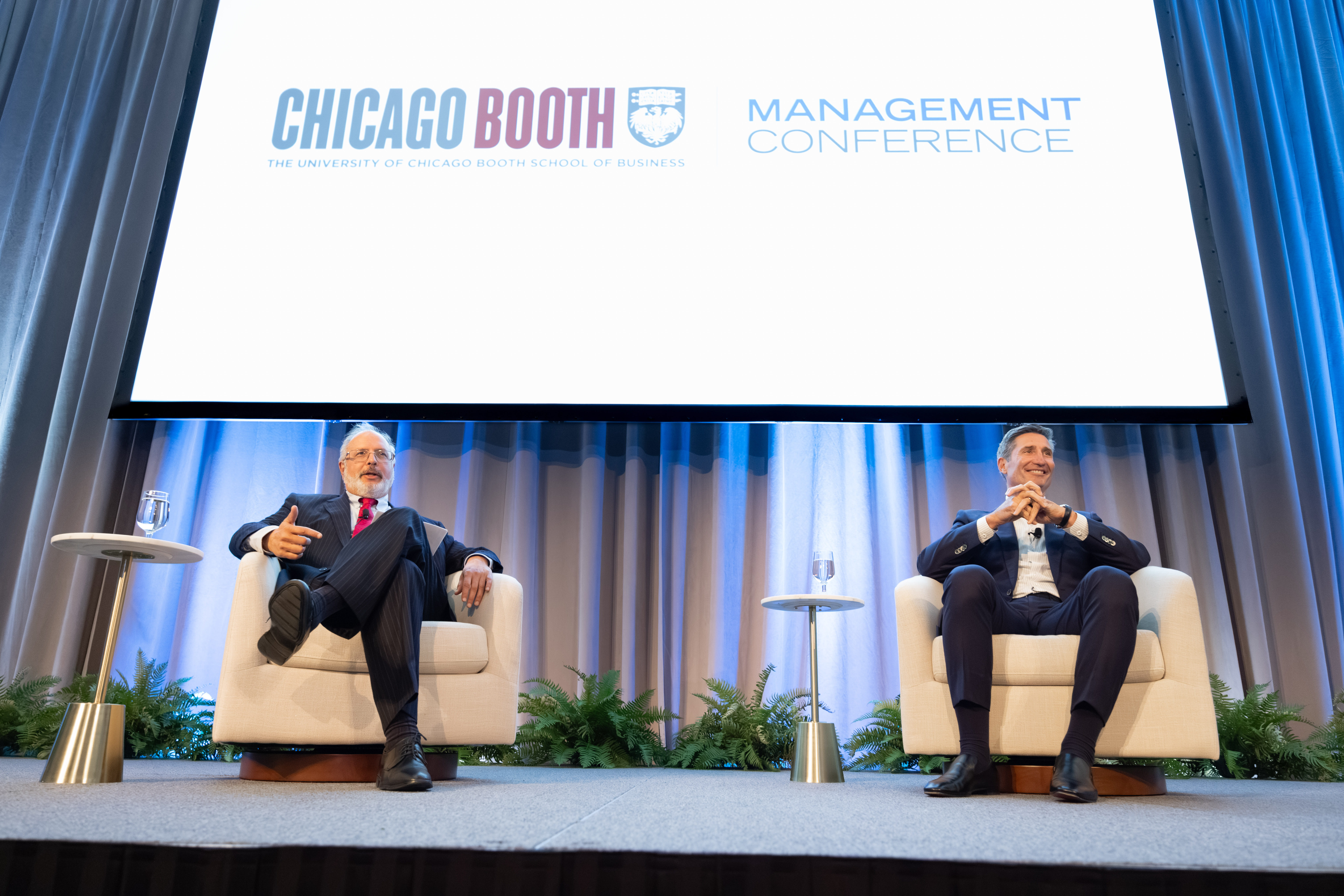 Anil Kashyap and Brian Niccol, MBA '03, during the 2026 ManCon keynote