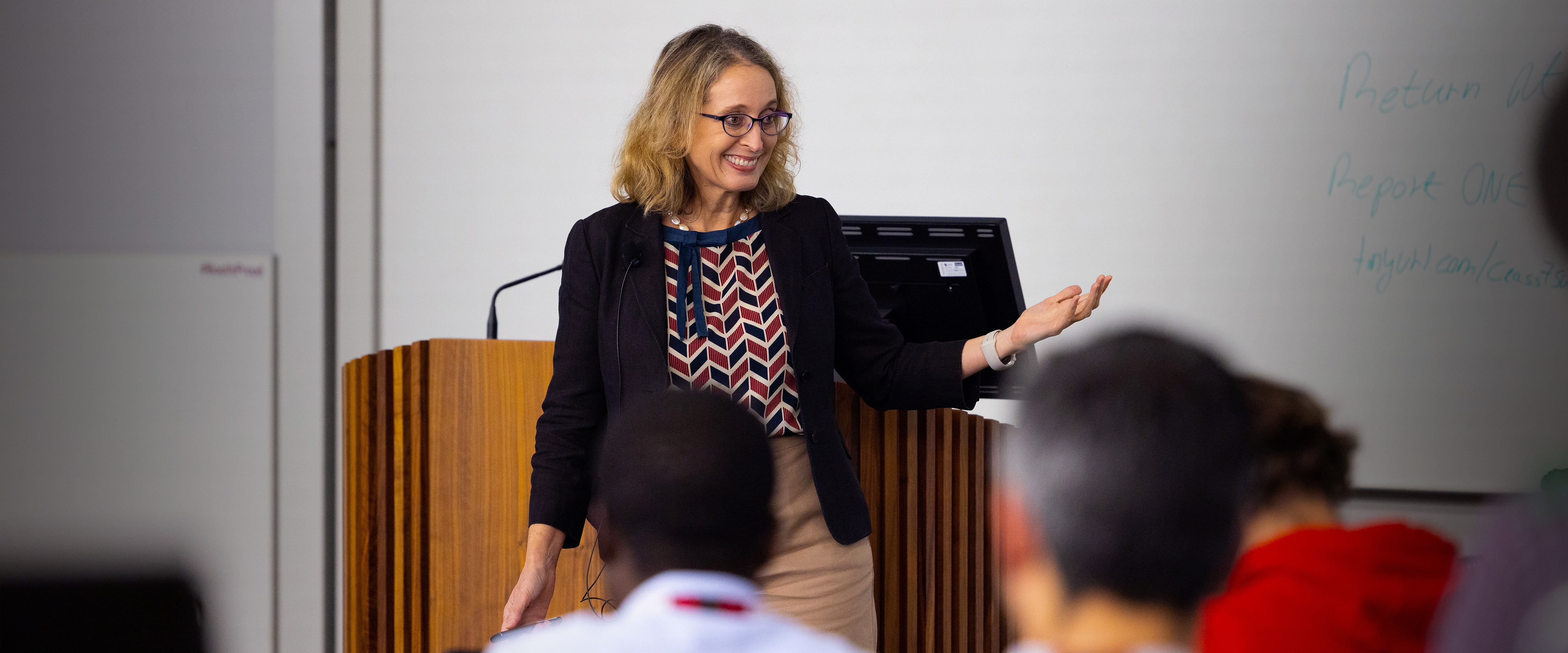 Ayelet Fishbach speaks in a classroom