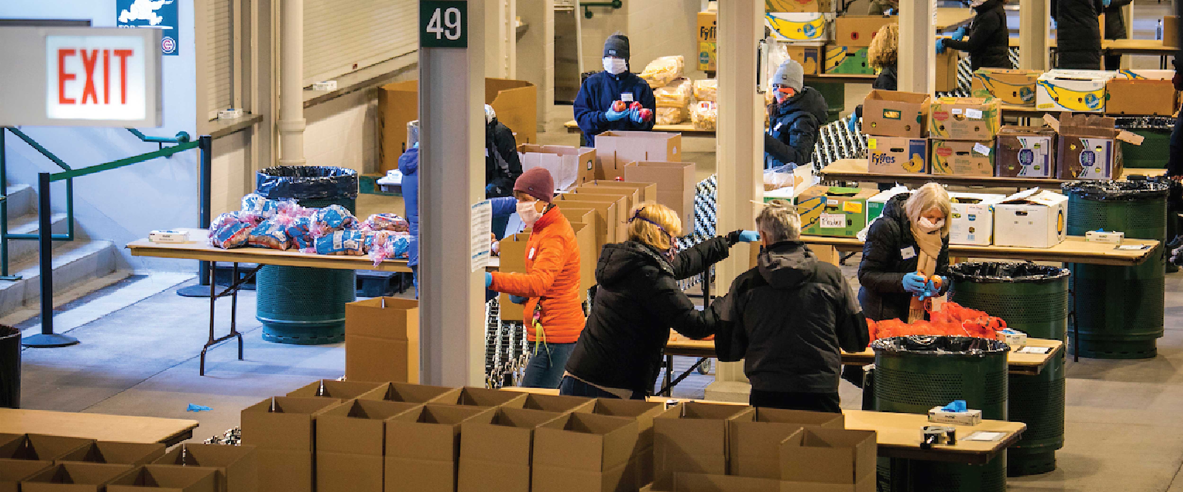Volunteers preparing and sorting food