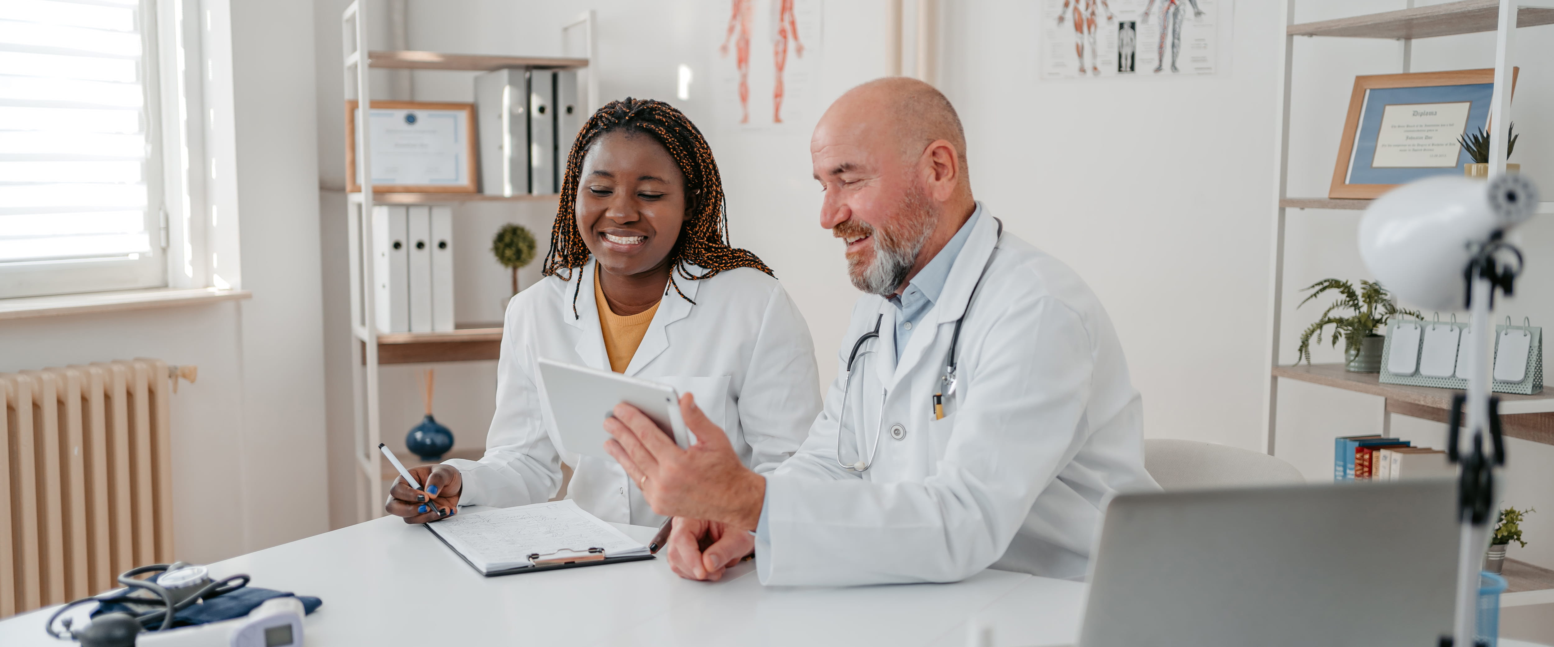 Two people in a healthcare setting. 