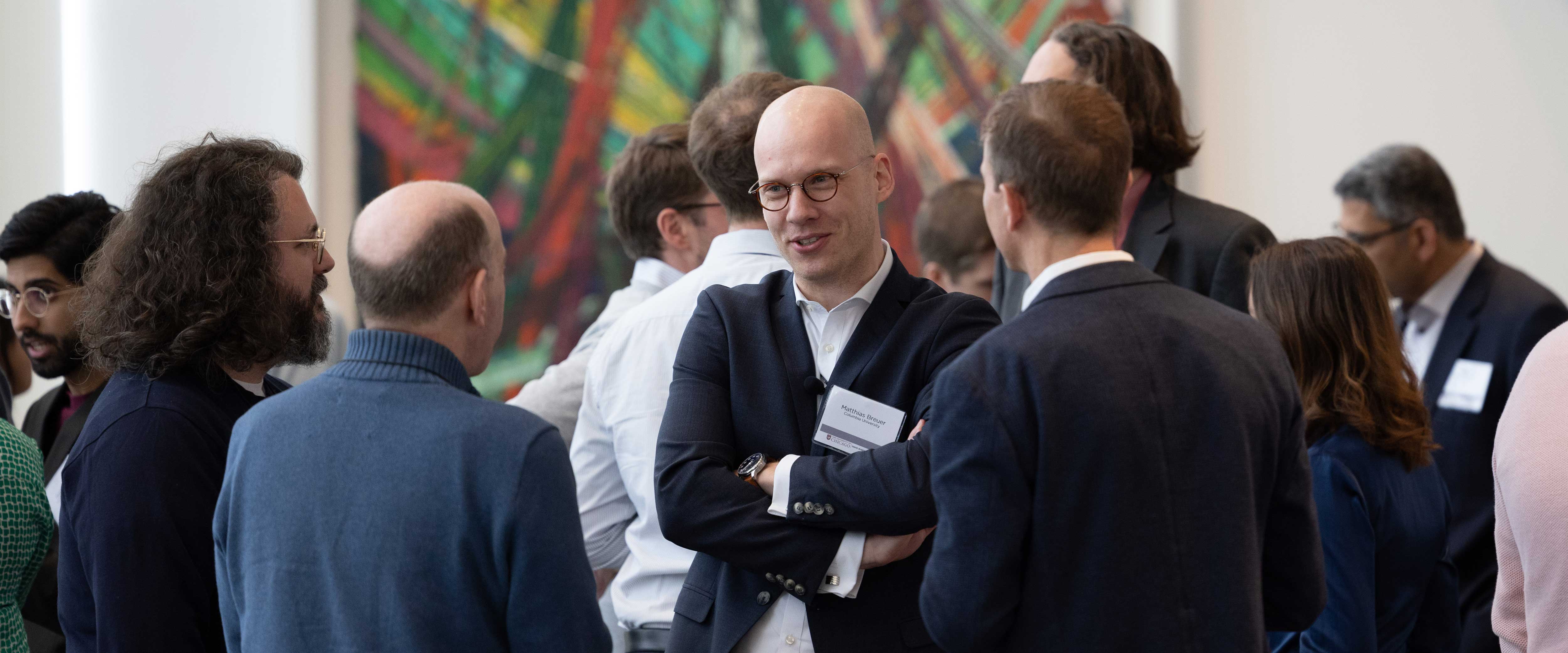 Matthias Breuer networking at an event