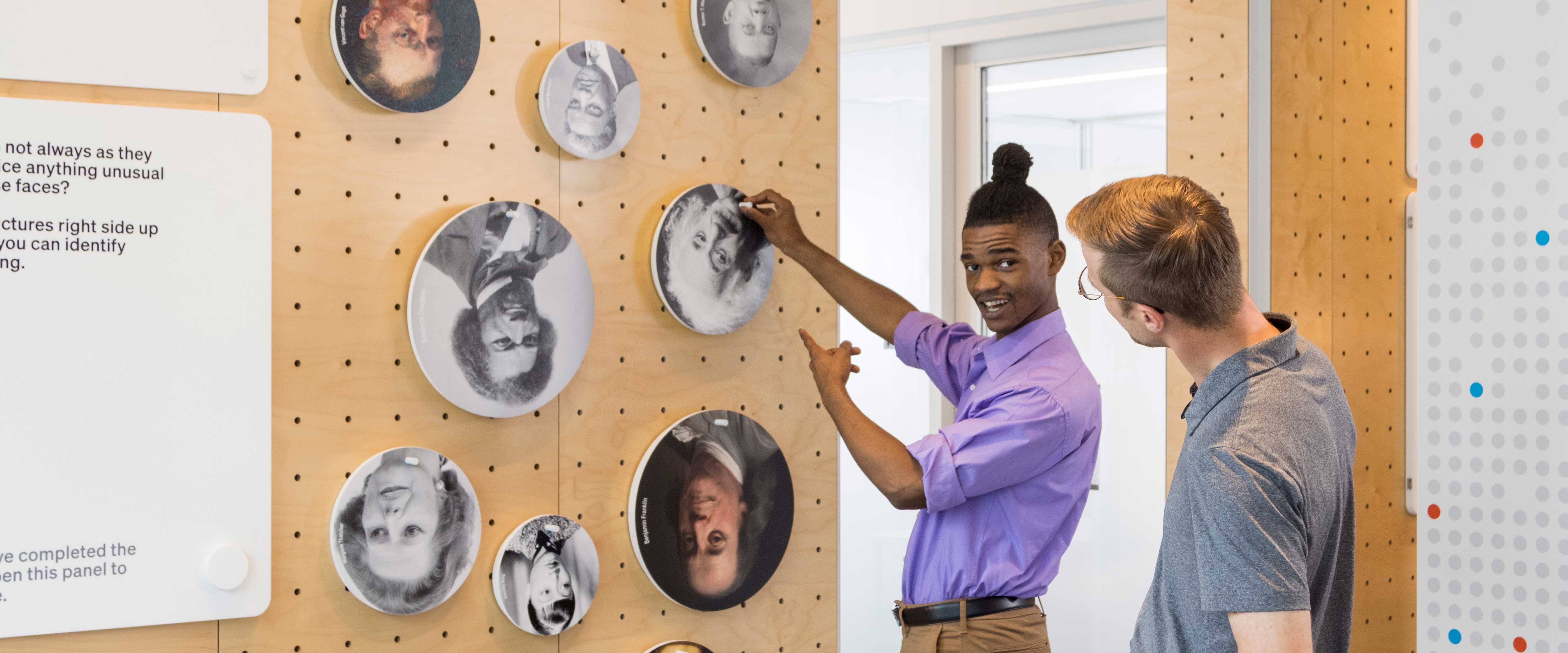 Men spinning the faces 