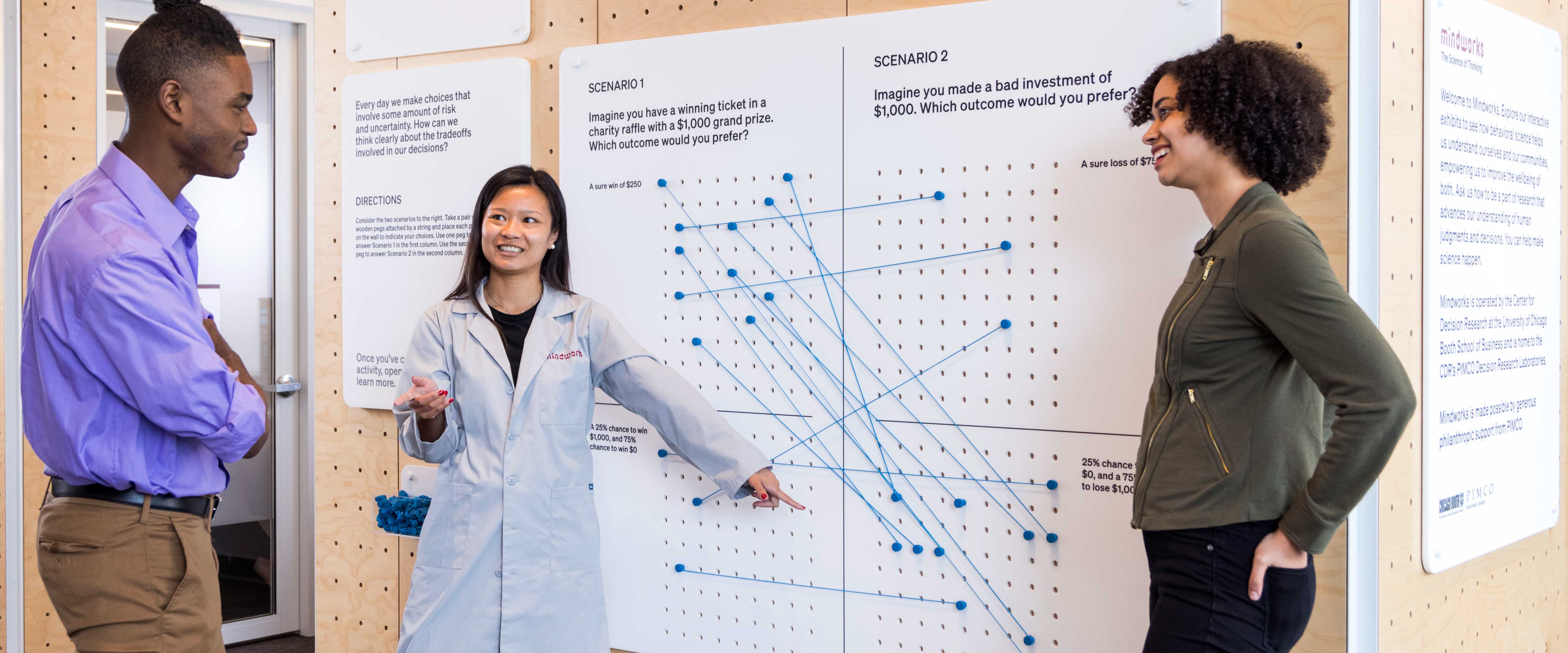 Guide helping participants with an exhibit