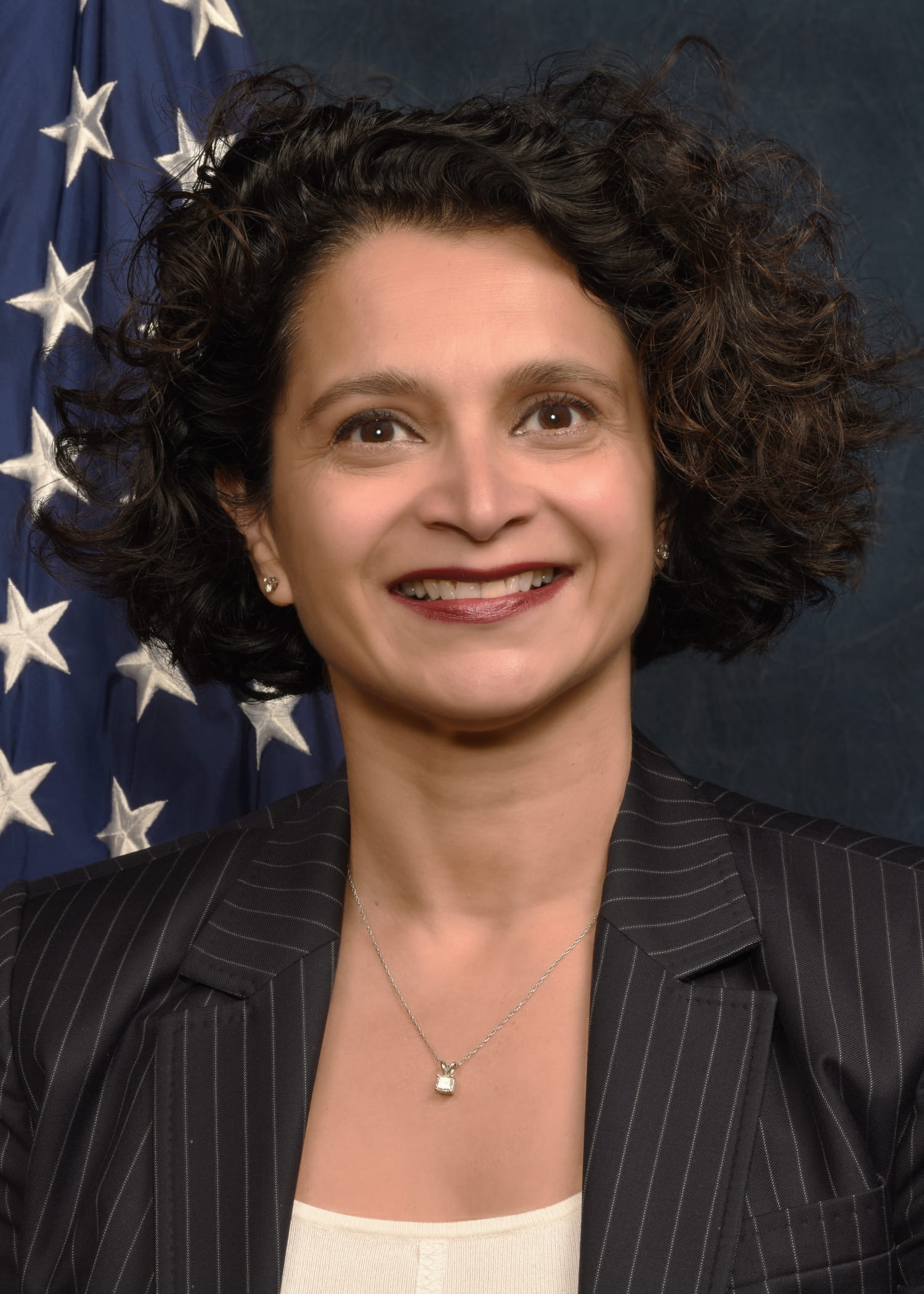 Sylvia Chou smiling in headshot