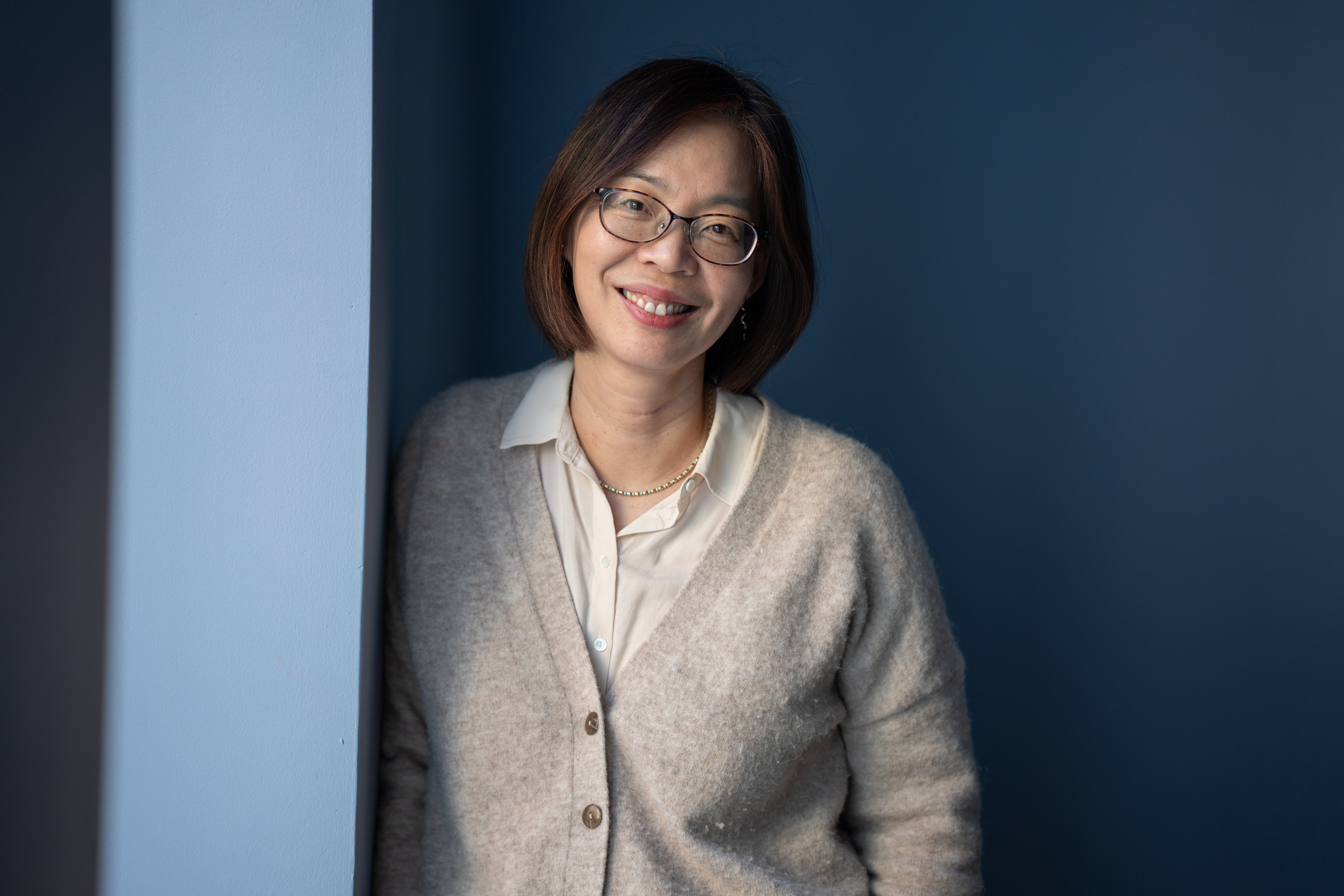 Sylvia Chou smiling in headshot