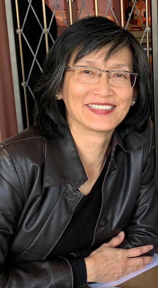 A woman smiling at the camera