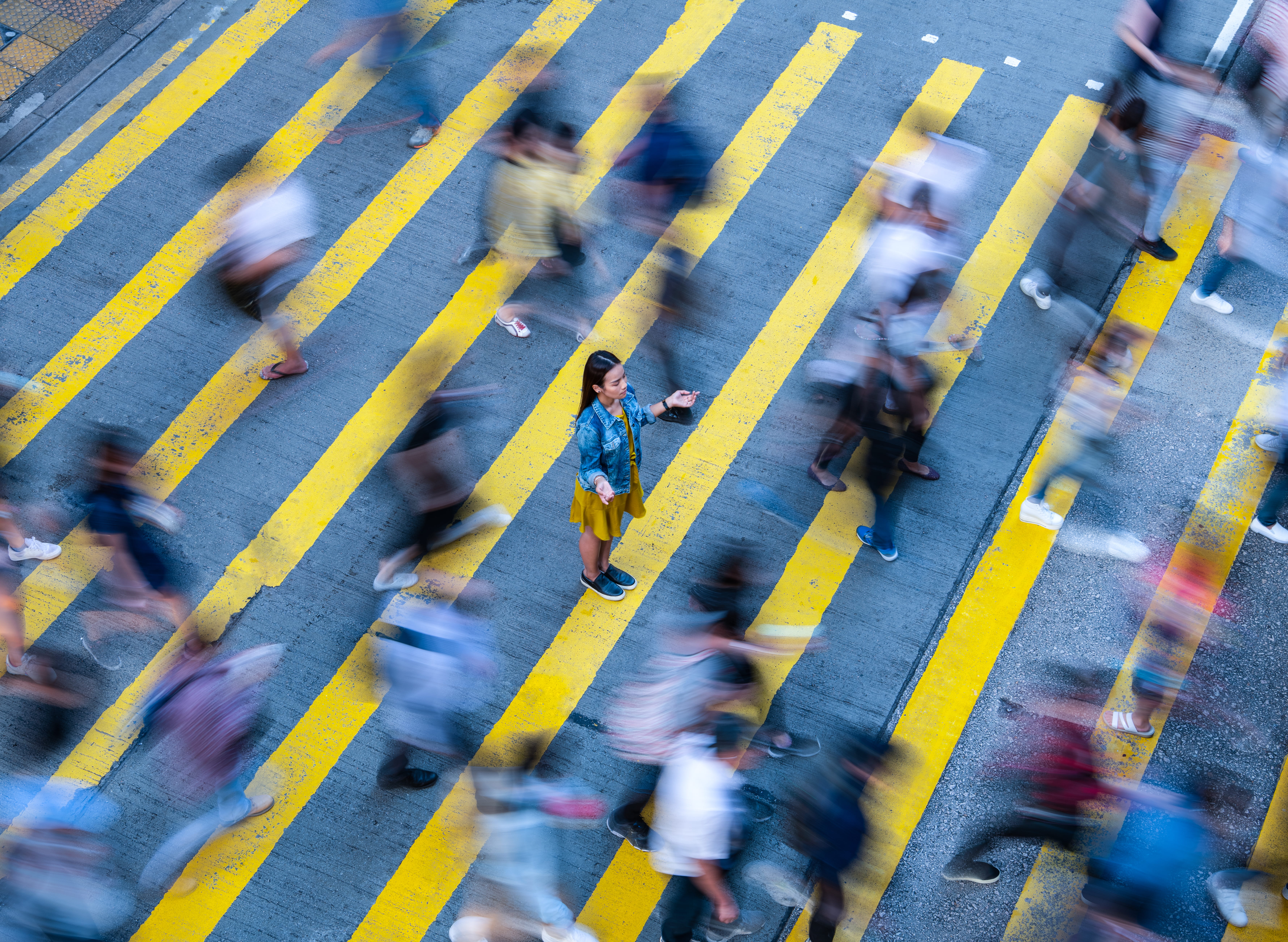 Color image of people in a crosswalk