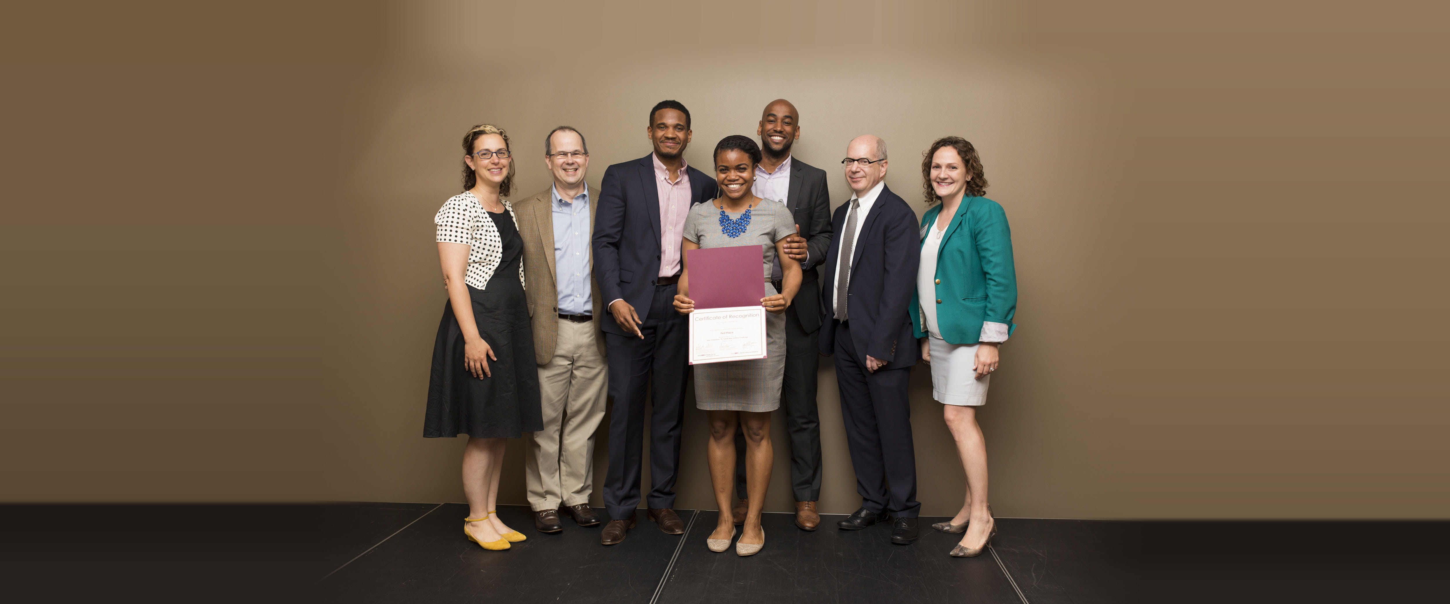 2014 SNVC winners Hello Tractor pose with their first place certificate