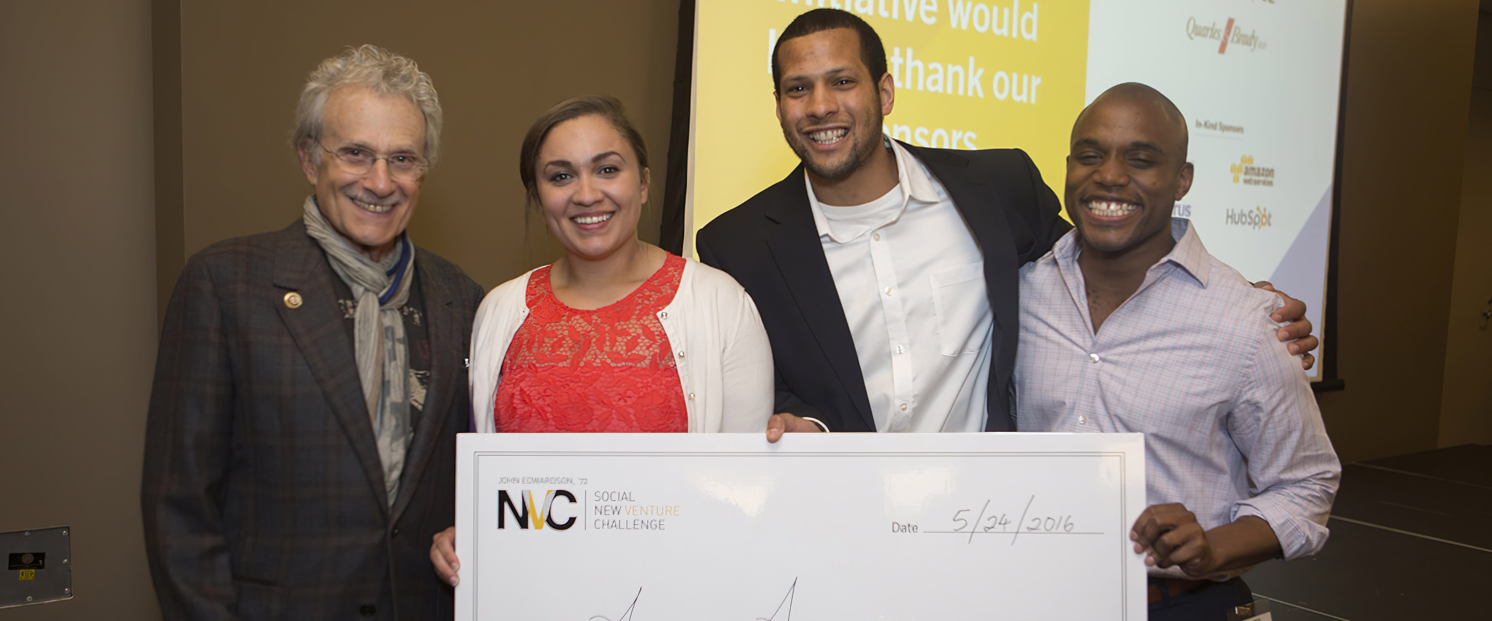 Ron Tarrson poses with SNVC winners Access Arc and their giant check