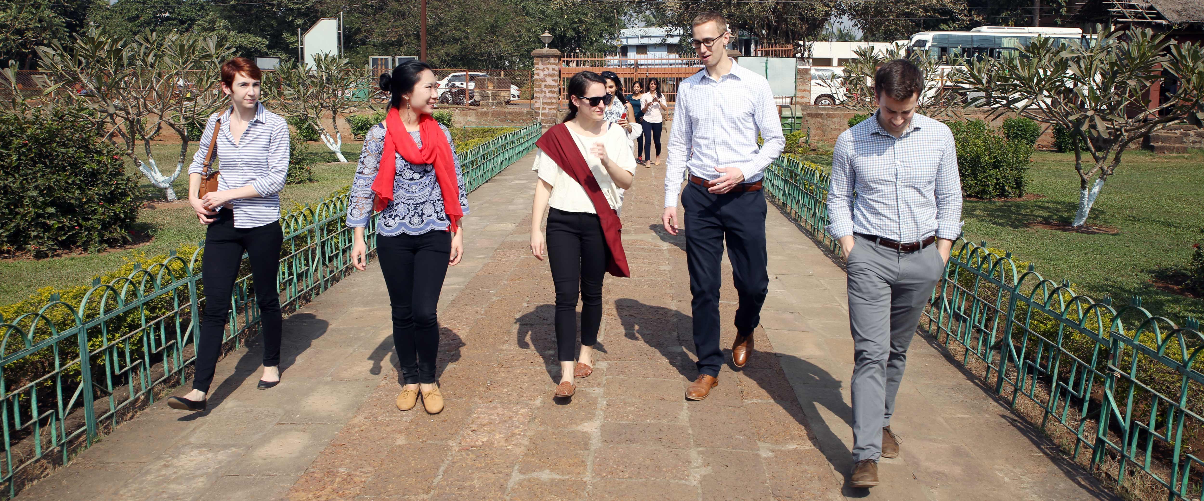 Students walking in a row in India